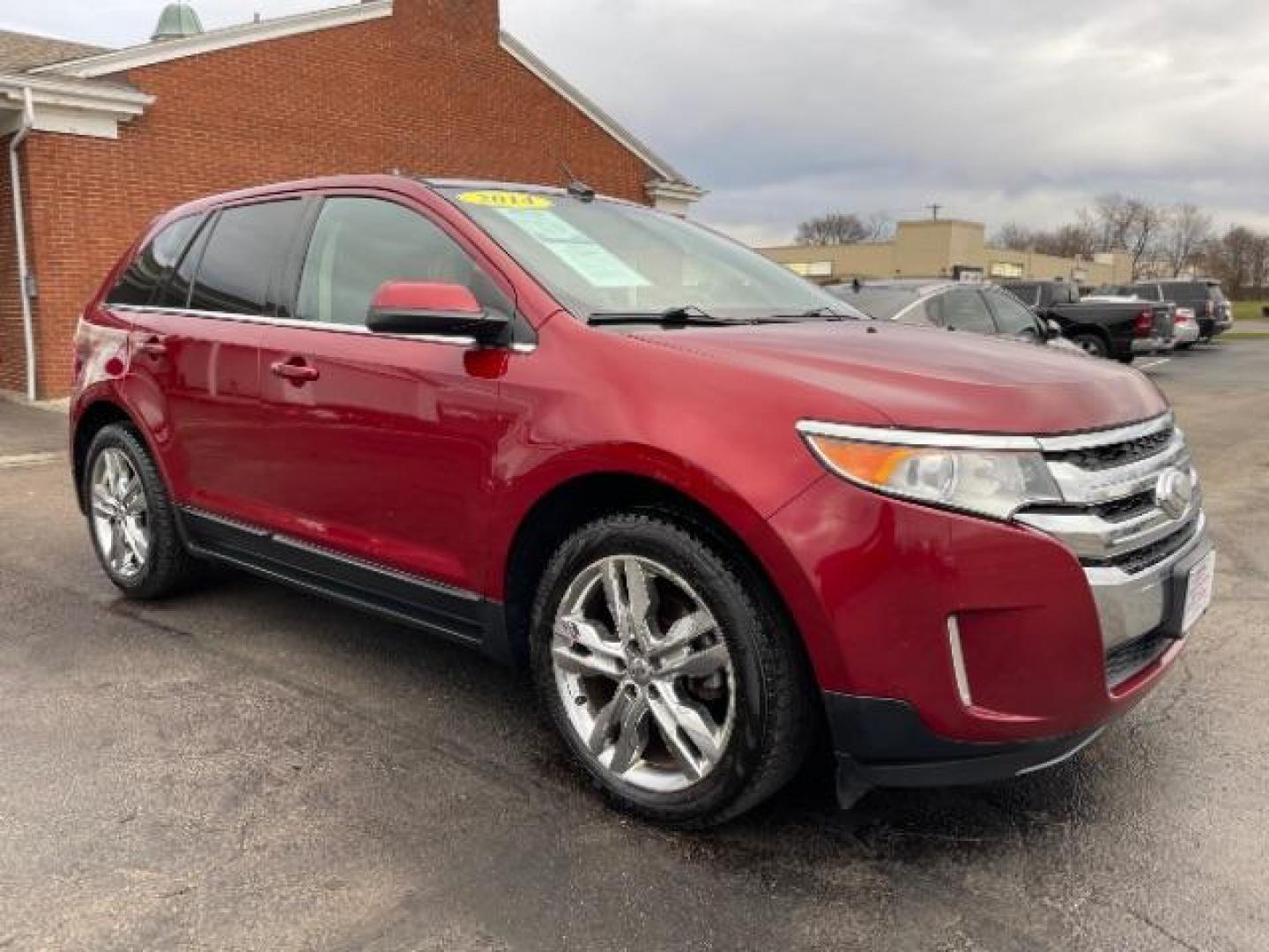 2014 Ruby Red Met Tinted CC Ford Edge Limited FWD (2FMDK3K94EB) with an 2.0L L4 DOHC 16V engine, 6-Speed Automatic transmission, located at 1184 Kauffman Ave, Fairborn, OH, 45324, (937) 908-9800, 39.807072, -84.030914 - Photo#0