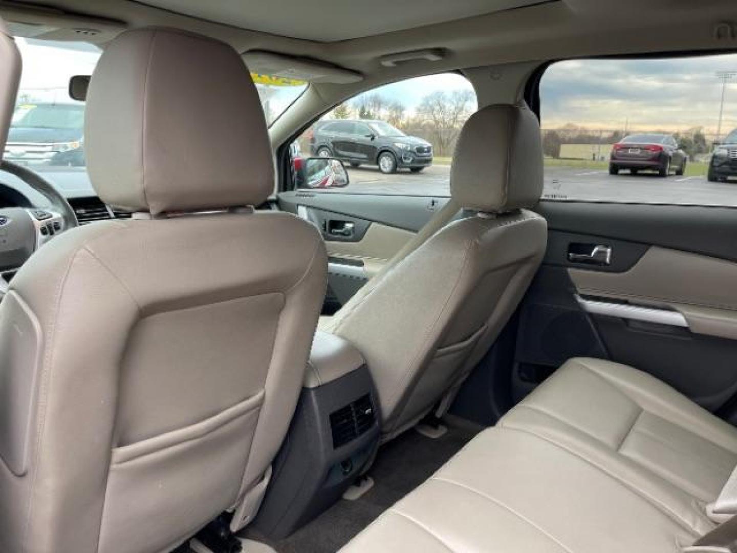 2014 Ruby Red Met Tinted CC Ford Edge Limited FWD (2FMDK3K94EB) with an 2.0L L4 DOHC 16V engine, 6-Speed Automatic transmission, located at 1184 Kauffman Ave, Fairborn, OH, 45324, (937) 908-9800, 39.807072, -84.030914 - Photo#9