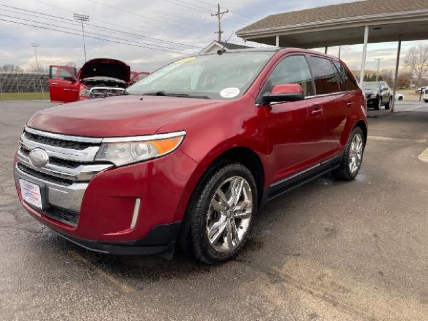 2014 Ruby Red Met Tinted CC Ford Edge Limited FWD (2FMDK3K94EB) with an 2.0L L4 DOHC 16V engine, 6-Speed Automatic transmission, located at 1184 Kauffman Ave, Fairborn, OH, 45324, (937) 908-9800, 39.807072, -84.030914 - Photo#1