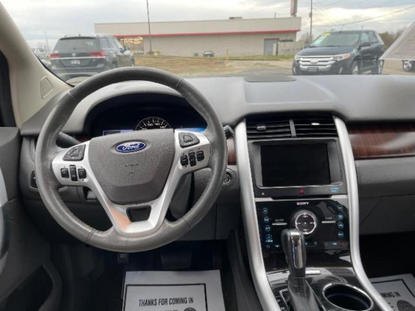 2014 Ruby Red Met Tinted CC Ford Edge Limited FWD (2FMDK3K94EB) with an 2.0L L4 DOHC 16V engine, 6-Speed Automatic transmission, located at 1184 Kauffman Ave, Fairborn, OH, 45324, (937) 908-9800, 39.807072, -84.030914 - Photo#7