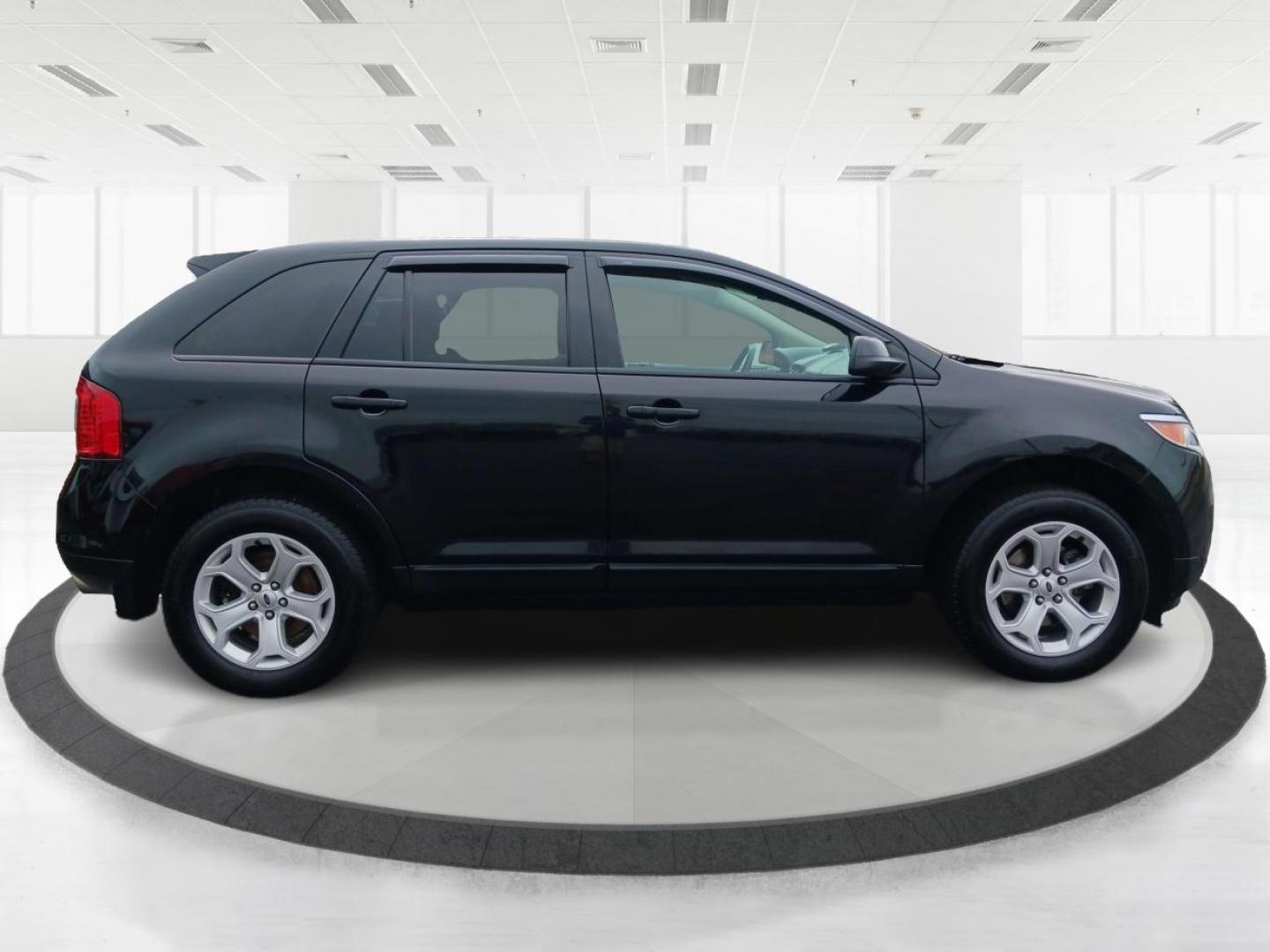 2014 Tuxedo Black Metallic Ford Edge (2FMDK3JC5EB) with an 3.5L V6 DOHC 24V engine, 6-Speed Automatic transmission, located at 1099 N County Rd 25A, Troy, OH, 45373, (937) 908-9800, 40.057079, -84.212883 - Photo#1