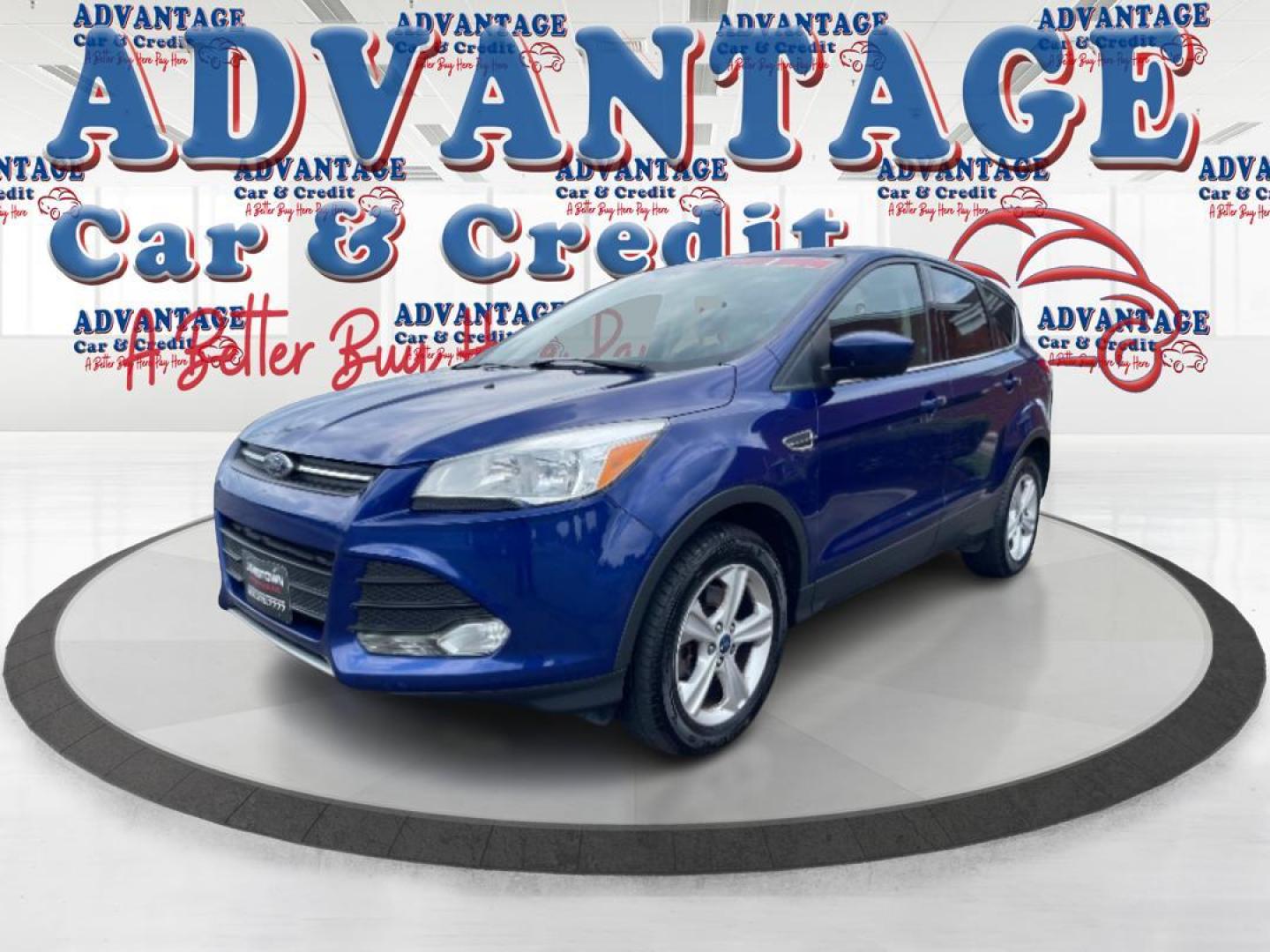 2014 Deep Impact Blue Ford Escape SE 4WD (1FMCU9G96EU) with an 2.0L L4 DOHC 16V engine, 6-Speed Automatic transmission, located at 4508 South Dixie Dr, Moraine, OH, 45439, (937) 908-9800, 39.689976, -84.218452 - Photo#5