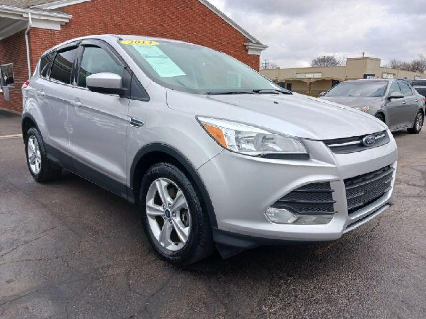 2014 Ingot Silver Metallic Ford Escape SE 4WD (1FMCU9G92EU) with an 2.0L L4 DOHC 16V engine, 6-Speed Automatic transmission, located at 1951 S Dayton Lakeview Rd., New Carlisle, OH, 45344, (937) 908-9800, 39.890999, -84.050255 - Photo#0