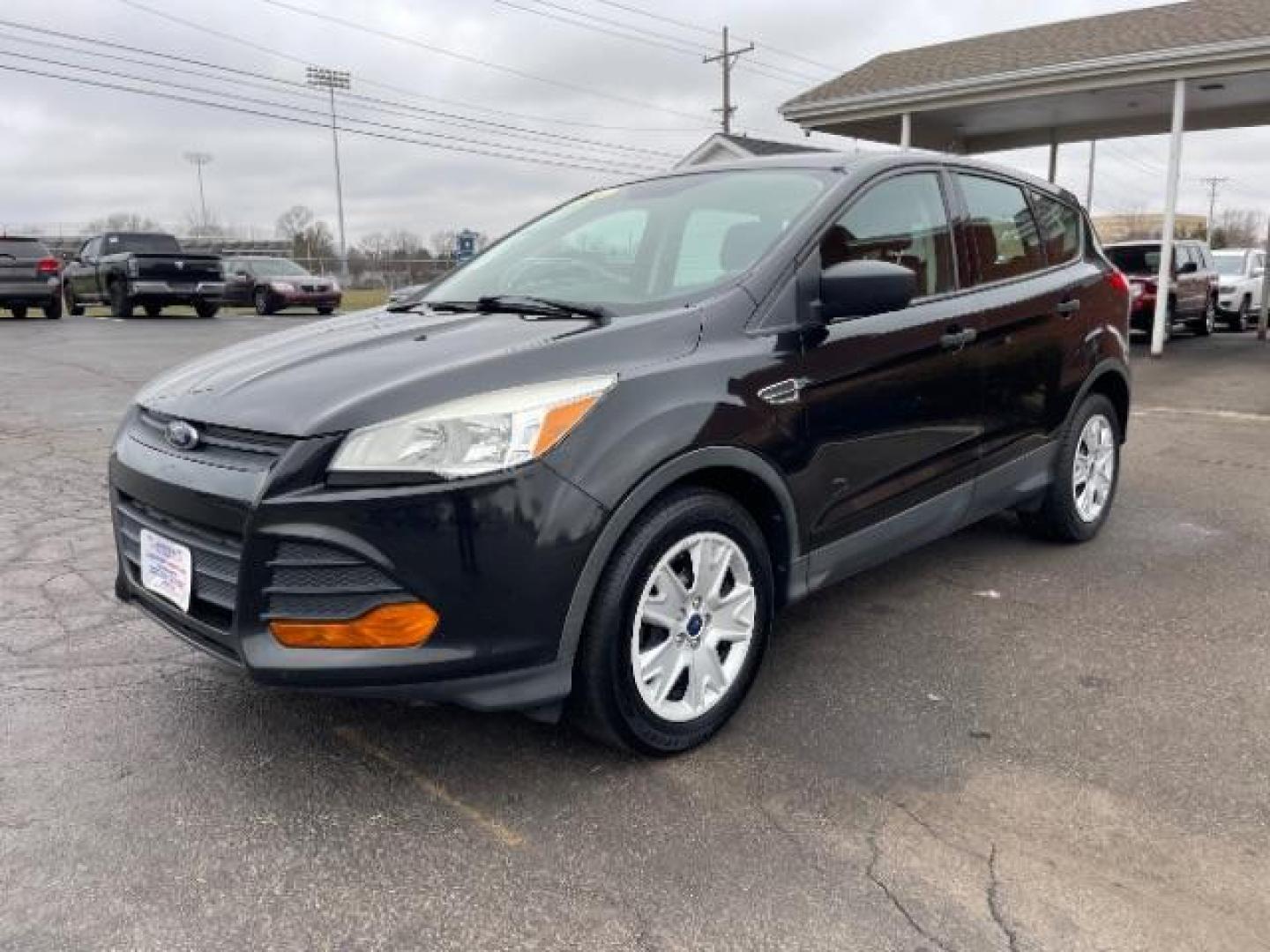 2014 Tuxedo Black Ford Escape S FWD (1FMCU0F78EU) with an 2.5L L4 DOHC 16V engine, 6-Speed Automatic transmission, located at 1951 S Dayton Lakeview Rd., New Carlisle, OH, 45344, (937) 908-9800, 39.890999, -84.050255 - Photo#1