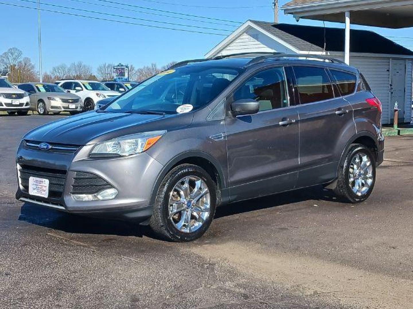 2014 Sterling Gray Metallic Ford Escape SE 4WD (1FMCU9G98EU) with an 2.0L L4 DOHC 16V engine, 6-Speed Automatic transmission, located at 401 Woodman Dr, Riverside, OH, 45431, (937) 908-9800, 39.760899, -84.123421 - Photo#2