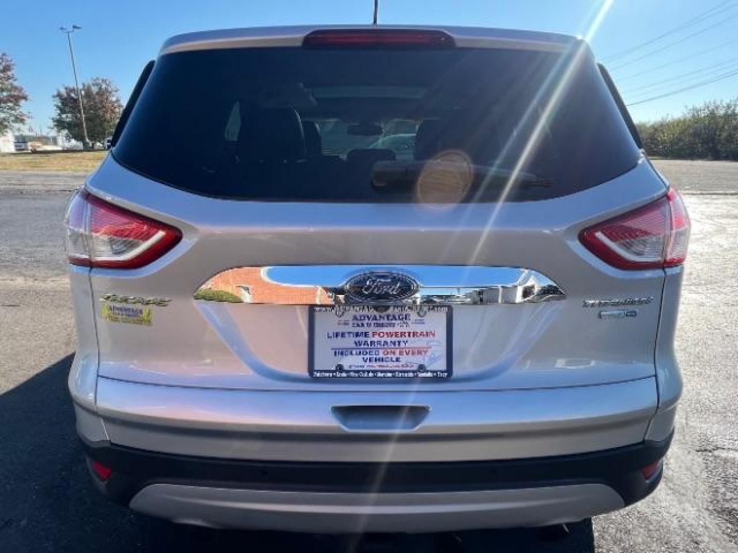 2014 Sterling Gray Metallic Ford Escape Titanium 4WD (1FMCU9J96EU) with an 2.0L L4 DOHC 16V engine, 6-Speed Automatic transmission, located at 1184 Kauffman Ave, Fairborn, OH, 45324, (937) 908-9800, 39.807072, -84.030914 - Photo#4