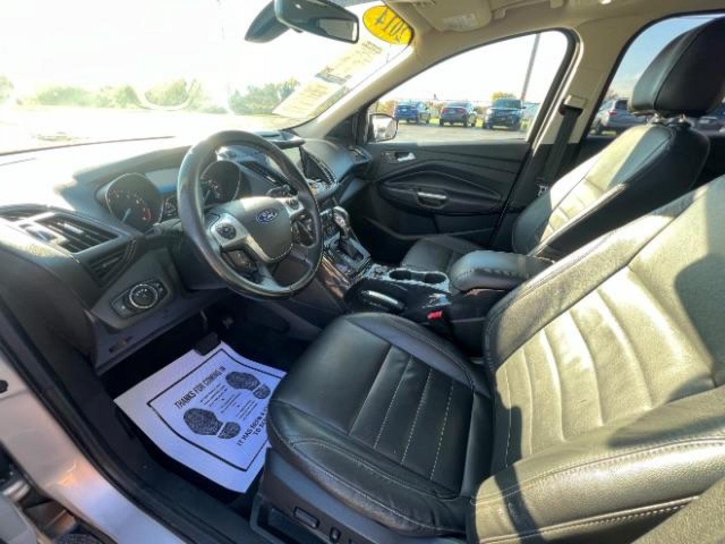 2014 Sterling Gray Metallic Ford Escape Titanium 4WD (1FMCU9J96EU) with an 2.0L L4 DOHC 16V engine, 6-Speed Automatic transmission, located at 1184 Kauffman Ave, Fairborn, OH, 45324, (937) 908-9800, 39.807072, -84.030914 - Photo#7