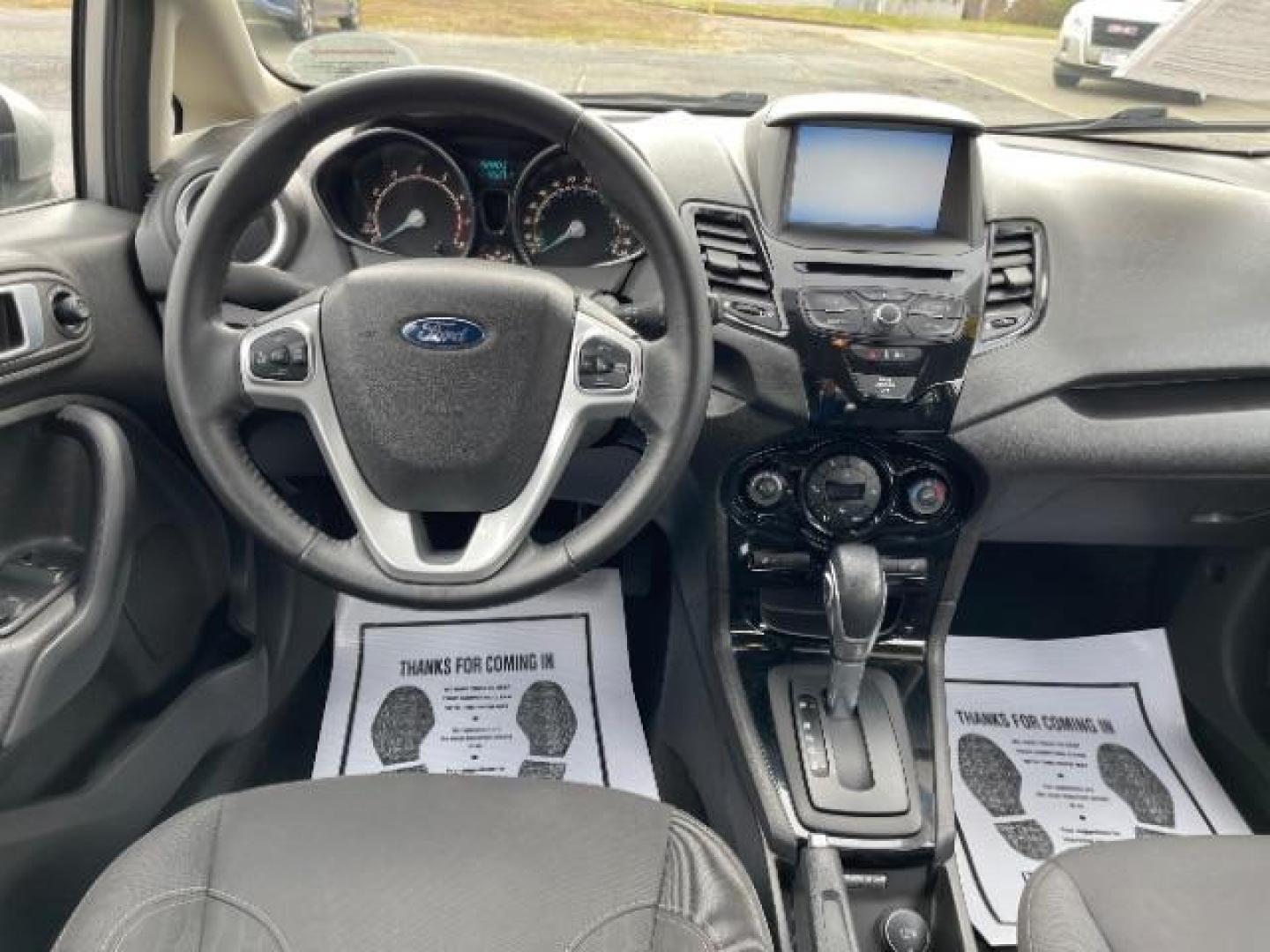 2014 Ingot Silver Metallic Ford Fiesta SE Sedan (3FADP4BJ6EM) with an 1.6L L4 DOHC 16V engine, located at 401 Woodman Dr, Riverside, OH, 45431, (937) 908-9800, 39.760899, -84.123421 - Photo#6