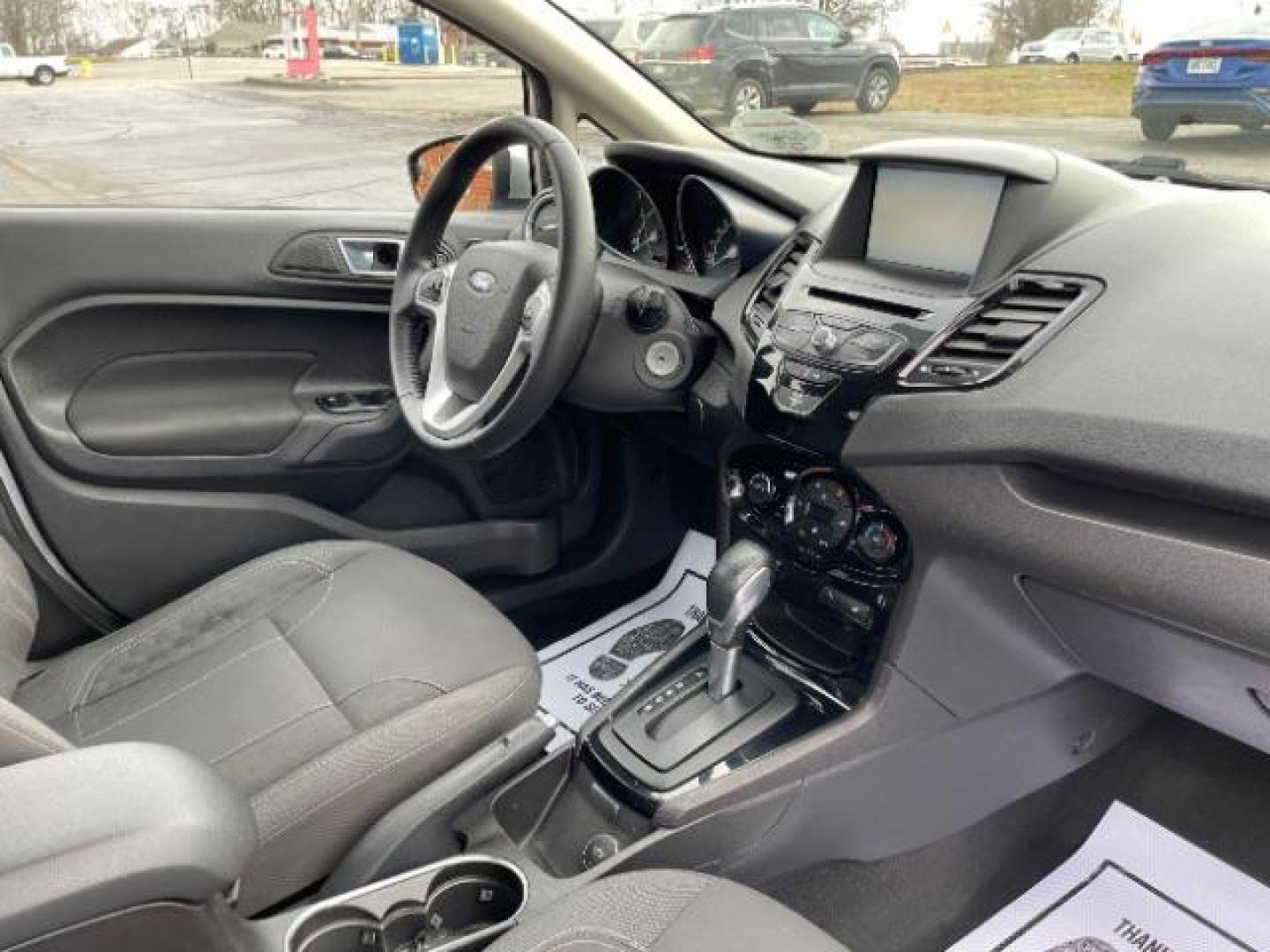 2014 Ingot Silver Metallic Ford Fiesta SE Sedan (3FADP4BJ6EM) with an 1.6L L4 DOHC 16V engine, located at 401 Woodman Dr, Riverside, OH, 45431, (937) 908-9800, 39.760899, -84.123421 - Photo#8