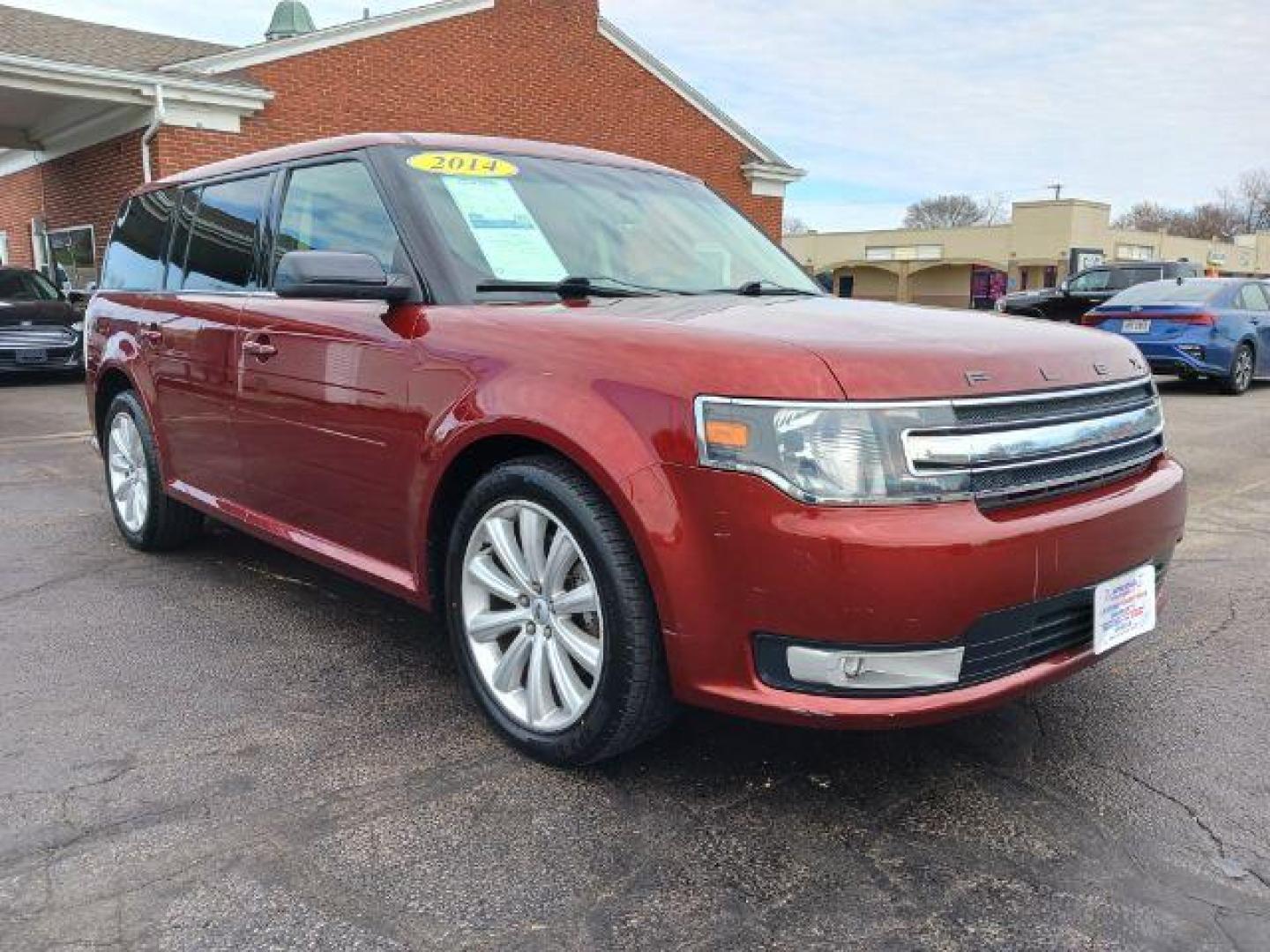 2014 Ruby Red Met Tinted CC Ford Flex SEL AWD (2FMHK6C81EB) with an 3.5L V6 DOHC 24V engine, 6-Speed Automatic Overdrive transmission, located at 1951 S Dayton Lakeview Rd., New Carlisle, OH, 45344, (937) 908-9800, 39.890999, -84.050255 - Photo#0