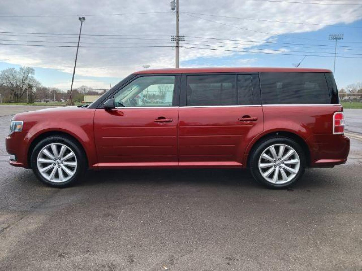 2014 Ruby Red Met Tinted CC Ford Flex SEL AWD (2FMHK6C81EB) with an 3.5L V6 DOHC 24V engine, 6-Speed Automatic Overdrive transmission, located at 1951 S Dayton Lakeview Rd., New Carlisle, OH, 45344, (937) 908-9800, 39.890999, -84.050255 - Photo#3