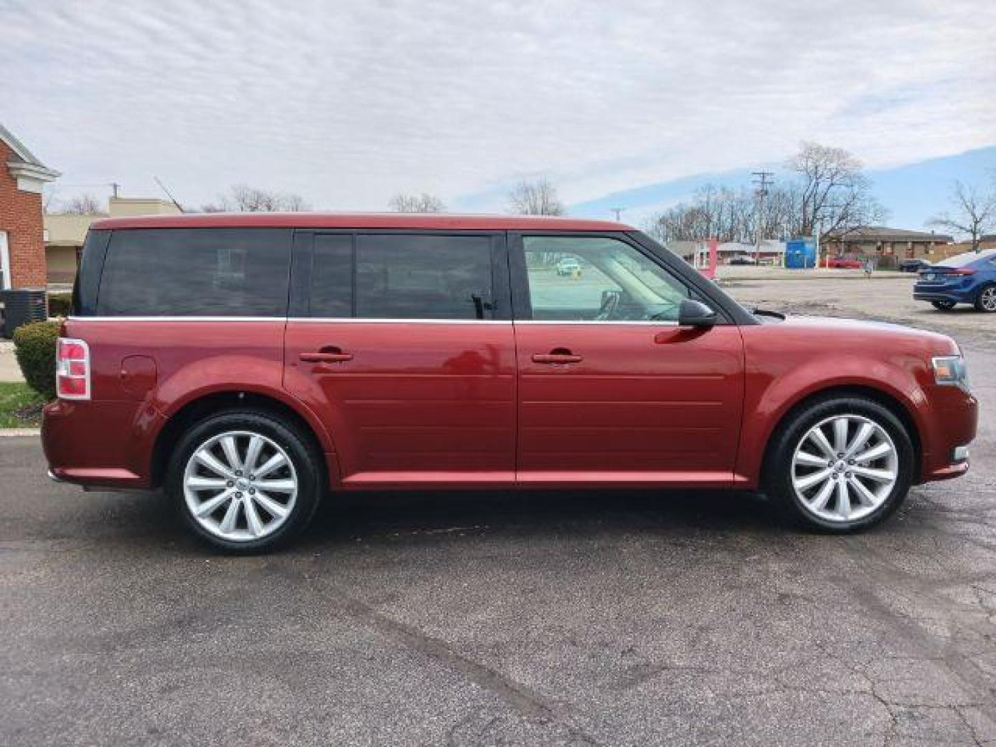 2014 Ruby Red Met Tinted CC Ford Flex SEL AWD (2FMHK6C81EB) with an 3.5L V6 DOHC 24V engine, 6-Speed Automatic Overdrive transmission, located at 1951 S Dayton Lakeview Rd., New Carlisle, OH, 45344, (937) 908-9800, 39.890999, -84.050255 - Photo#4