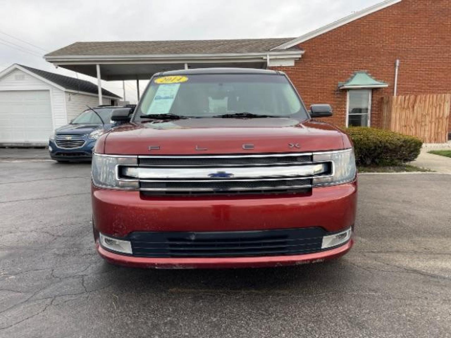 2014 Orange Ford Flex SEL FWD (2FMGK5C89EB) with an 3.5L V6 DOHC 24V engine, 6-Speed Automatic Overdrive transmission, located at 401 Woodman Dr, Riverside, OH, 45431, (937) 908-9800, 39.760899, -84.123421 - Photo#4