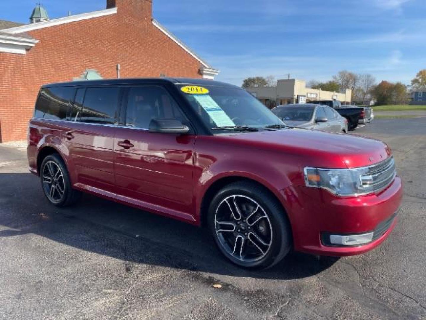 2014 Ruby Red Met Tinted CC Ford Flex SEL AWD (2FMHK6C86EB) with an 3.5L V6 DOHC 24V engine, 6-Speed Automatic Overdrive transmission, located at 4508 South Dixie Dr, Moraine, OH, 45439, (937) 908-9800, 39.689976, -84.218452 - Photo#0