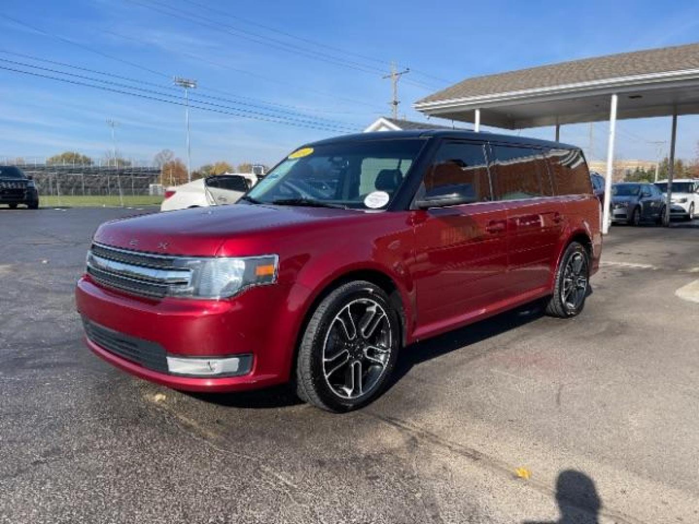 2014 Ruby Red Met Tinted CC Ford Flex SEL AWD (2FMHK6C86EB) with an 3.5L V6 DOHC 24V engine, 6-Speed Automatic Overdrive transmission, located at 4508 South Dixie Dr, Moraine, OH, 45439, (937) 908-9800, 39.689976, -84.218452 - Photo#2