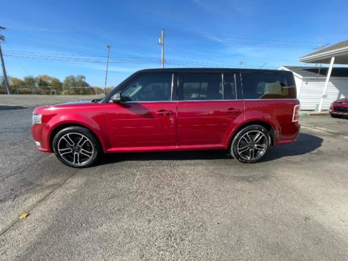 2014 Ruby Red Met Tinted CC Ford Flex SEL AWD (2FMHK6C86EB) with an 3.5L V6 DOHC 24V engine, 6-Speed Automatic Overdrive transmission, located at 4508 South Dixie Dr, Moraine, OH, 45439, (937) 908-9800, 39.689976, -84.218452 - Photo#3