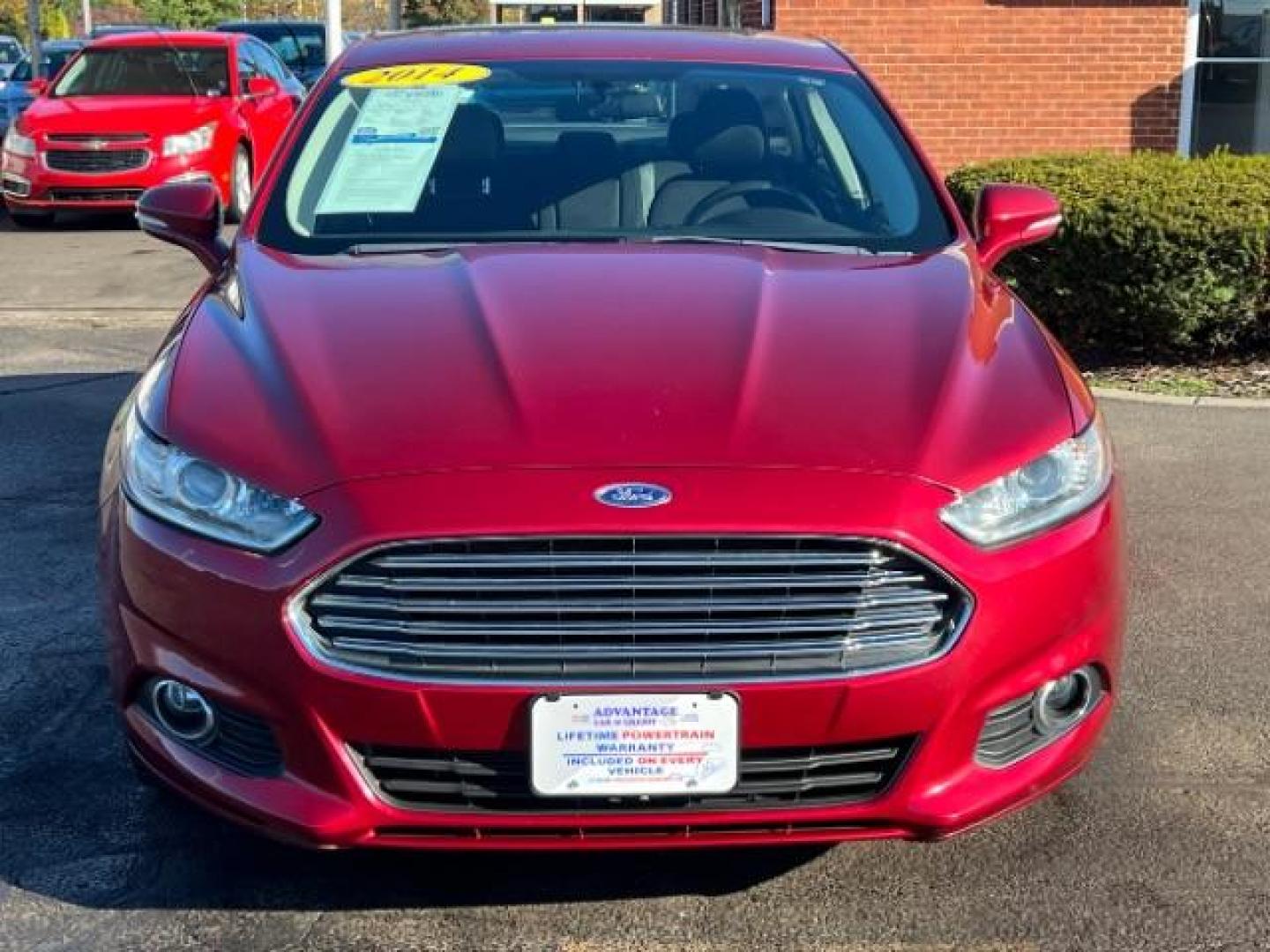 2014 Ruby Red Met Tinted CC Ford Fusion SE (3FA6P0H77ER) with an 2.5L L4 DOHC 16V engine, located at 1184 Kauffman Ave, Fairborn, OH, 45324, (937) 908-9800, 39.807072, -84.030914 - Photo#1