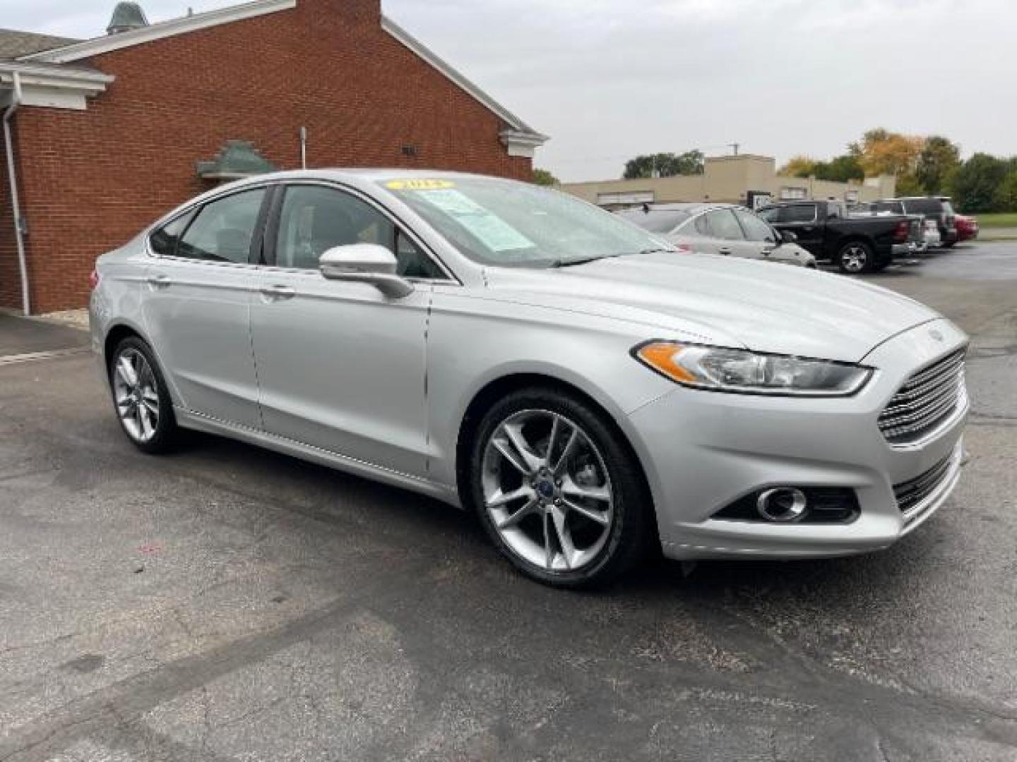 2014 Sterling Gray Ford Fusion Titanium (3FA6P0K90ER) with an 2.0L L4 DOHC 16V engine, located at 1230 East Main St, Xenia, OH, 45385, (937) 908-9800, 39.688026, -83.910172 - Photo#0