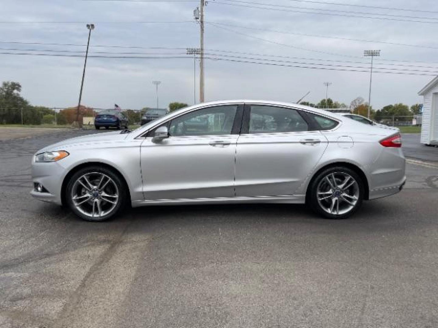 2014 Sterling Gray Ford Fusion Titanium (3FA6P0K90ER) with an 2.0L L4 DOHC 16V engine, located at 1230 East Main St, Xenia, OH, 45385, (937) 908-9800, 39.688026, -83.910172 - Photo#3