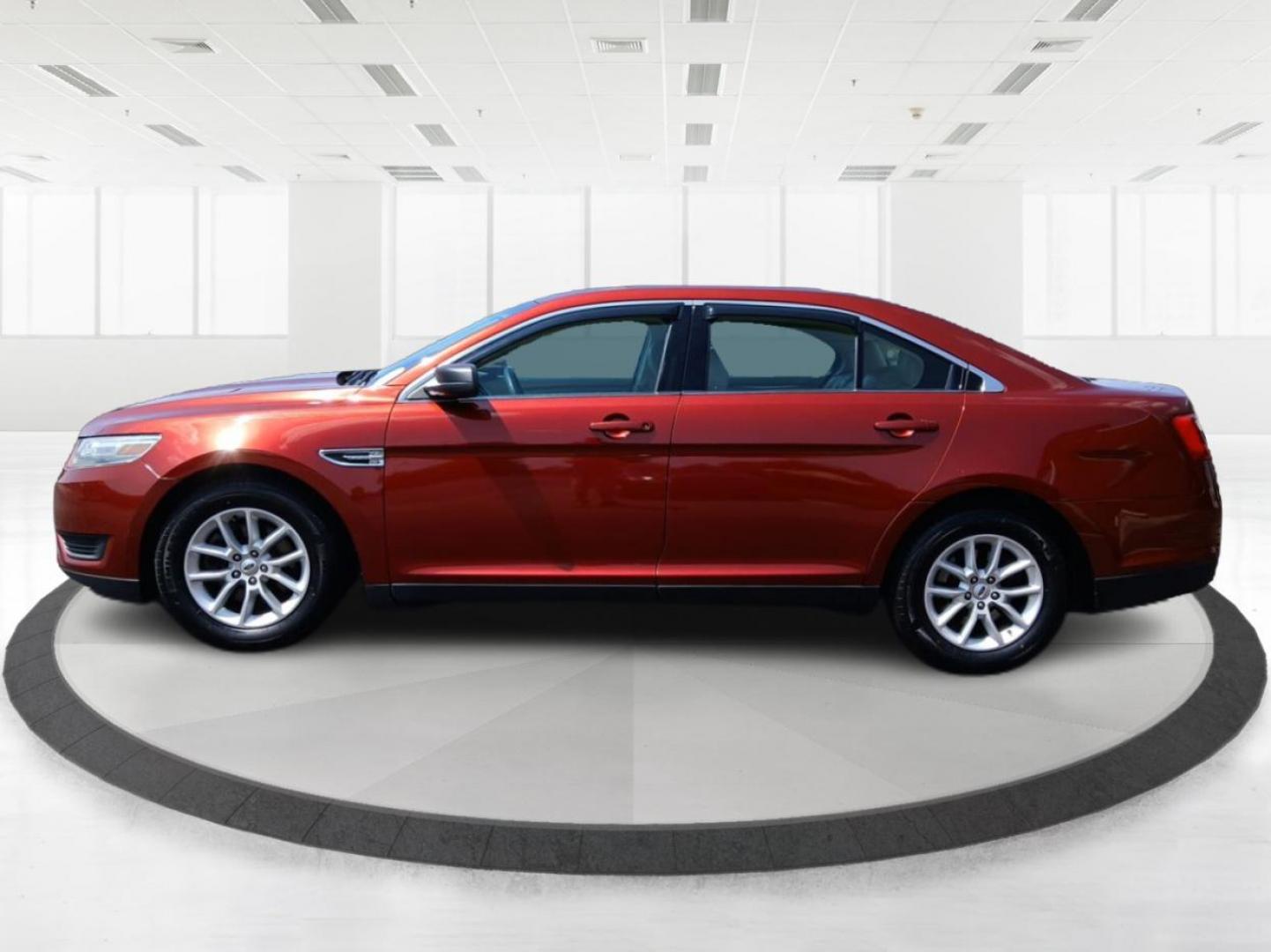 2014 Sunset Metallic Ford Taurus SE FWD (1FAHP2D88EG) with an 3.5L V6 DOHC 24V engine, 6-Speed Automatic transmission, located at 880 E. National Road, Vandalia, OH, 45377, (937) 908-9800, 39.891918, -84.183594 - Photo#5