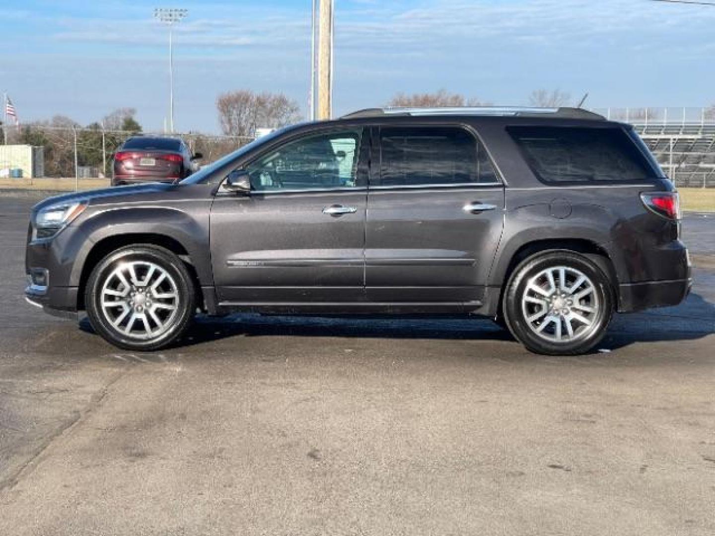 2014 Iridium Metallic GMC Acadia Denali AWD (1GKKVTKD4EJ) with an 3.6L V6 DOHC 24V engine, 6-Speed Automatic transmission, located at 401 Woodman Dr, Riverside, OH, 45431, (937) 908-9800, 39.760899, -84.123421 - Photo#2