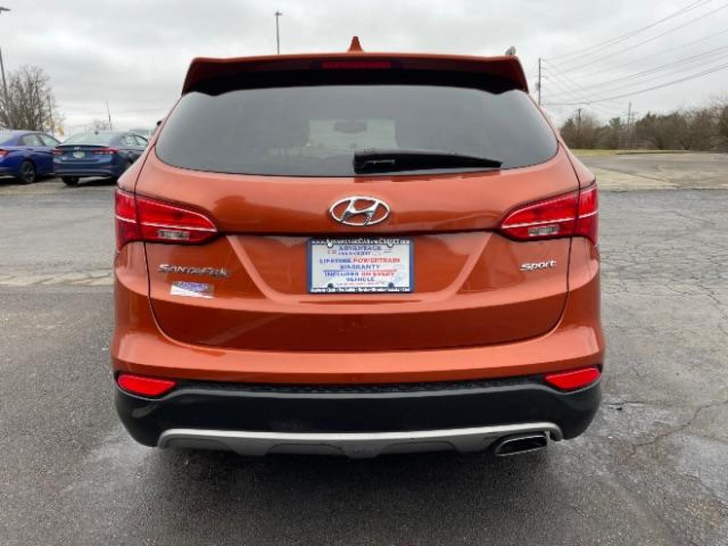 2014 Canyon Copper Hyundai Santa Fe Sport 2.4 FWD (5XYZT3LB1EG) with an 2.4L L4 DOHC 16V engine, 6-Speed Automatic transmission, located at 1184 Kauffman Ave, Fairborn, OH, 45324, (937) 908-9800, 39.807072, -84.030914 - Photo#4