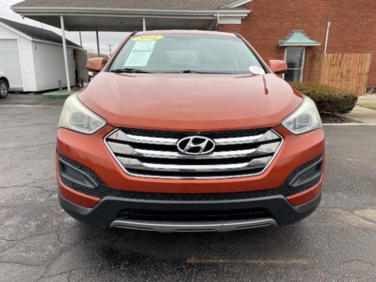 2014 Canyon Copper Hyundai Santa Fe Sport 2.4 FWD (5XYZT3LB1EG) with an 2.4L L4 DOHC 16V engine, 6-Speed Automatic transmission, located at 1184 Kauffman Ave, Fairborn, OH, 45324, (937) 908-9800, 39.807072, -84.030914 - Photo#5