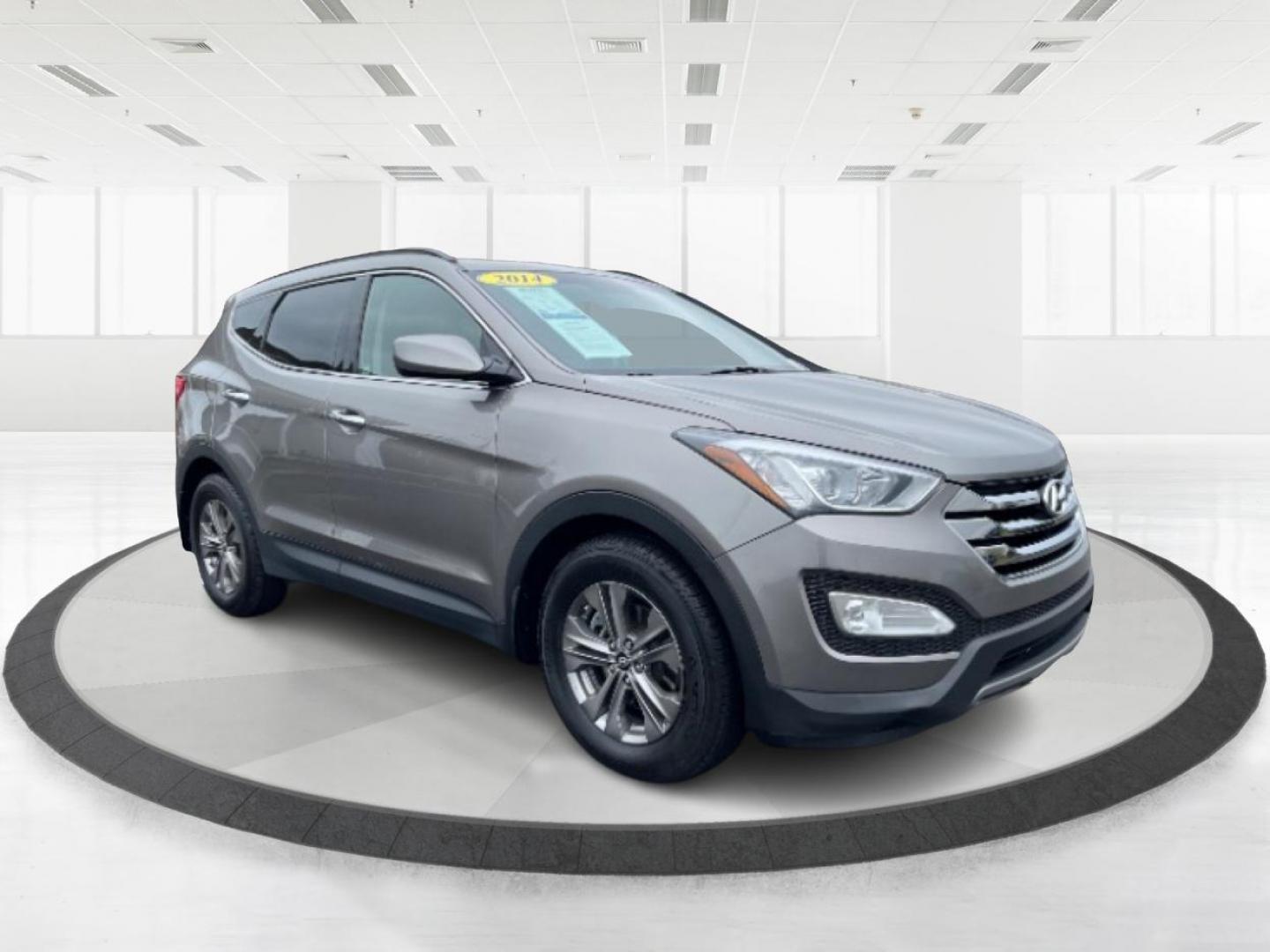 2014 Mineral Gray Hyundai Santa Fe (5XYZU3LB3EG) with an 2.4L L4 DOHC 16V engine, 6-Speed Automatic transmission, located at 1099 N County Rd 25A, Troy, OH, 45373, (937) 908-9800, 40.057079, -84.212883 - Photo#0