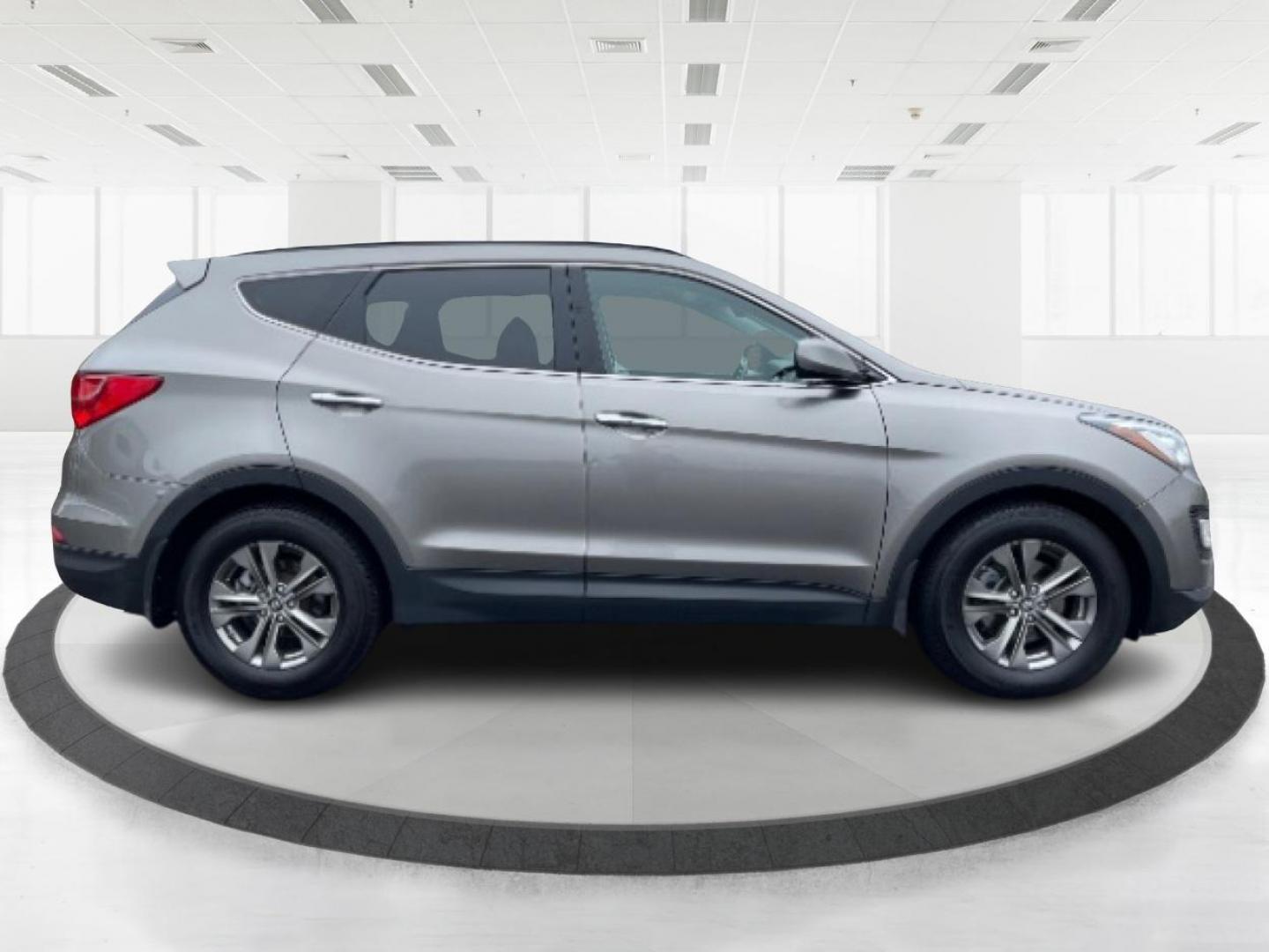 2014 Mineral Gray Hyundai Santa Fe (5XYZU3LB3EG) with an 2.4L L4 DOHC 16V engine, 6-Speed Automatic transmission, located at 1099 N County Rd 25A, Troy, OH, 45373, (937) 908-9800, 40.057079, -84.212883 - Photo#1