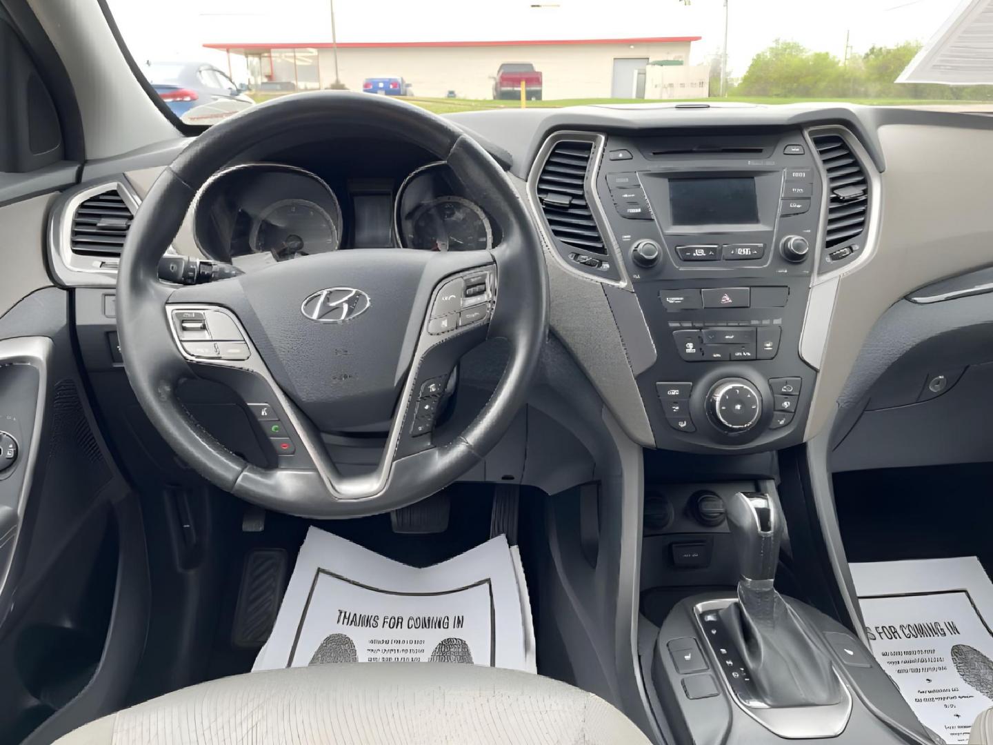 2014 Mineral Gray Hyundai Santa Fe (5XYZU3LB3EG) with an 2.4L L4 DOHC 16V engine, 6-Speed Automatic transmission, located at 1099 N County Rd 25A, Troy, OH, 45373, (937) 908-9800, 40.057079, -84.212883 - Photo#7