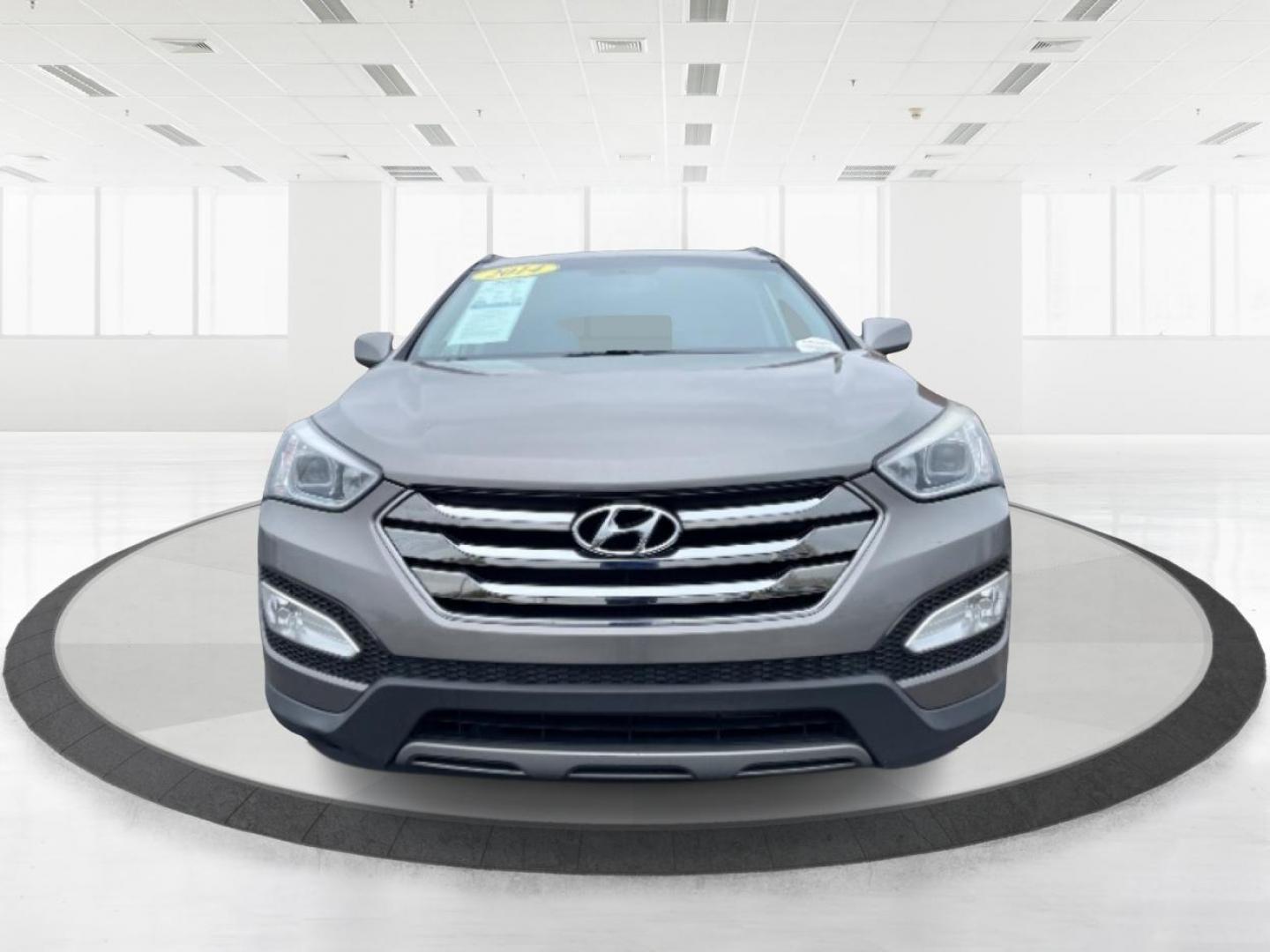 2014 Mineral Gray Hyundai Santa Fe (5XYZU3LB3EG) with an 2.4L L4 DOHC 16V engine, 6-Speed Automatic transmission, located at 1099 N County Rd 25A, Troy, OH, 45373, (937) 908-9800, 40.057079, -84.212883 - Photo#4