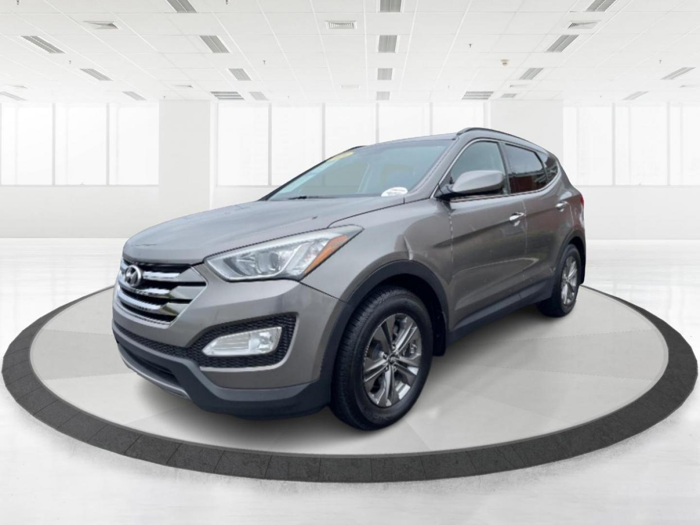 2014 Mineral Gray Hyundai Santa Fe (5XYZU3LB3EG) with an 2.4L L4 DOHC 16V engine, 6-Speed Automatic transmission, located at 1099 N County Rd 25A, Troy, OH, 45373, (937) 908-9800, 40.057079, -84.212883 - Photo#5