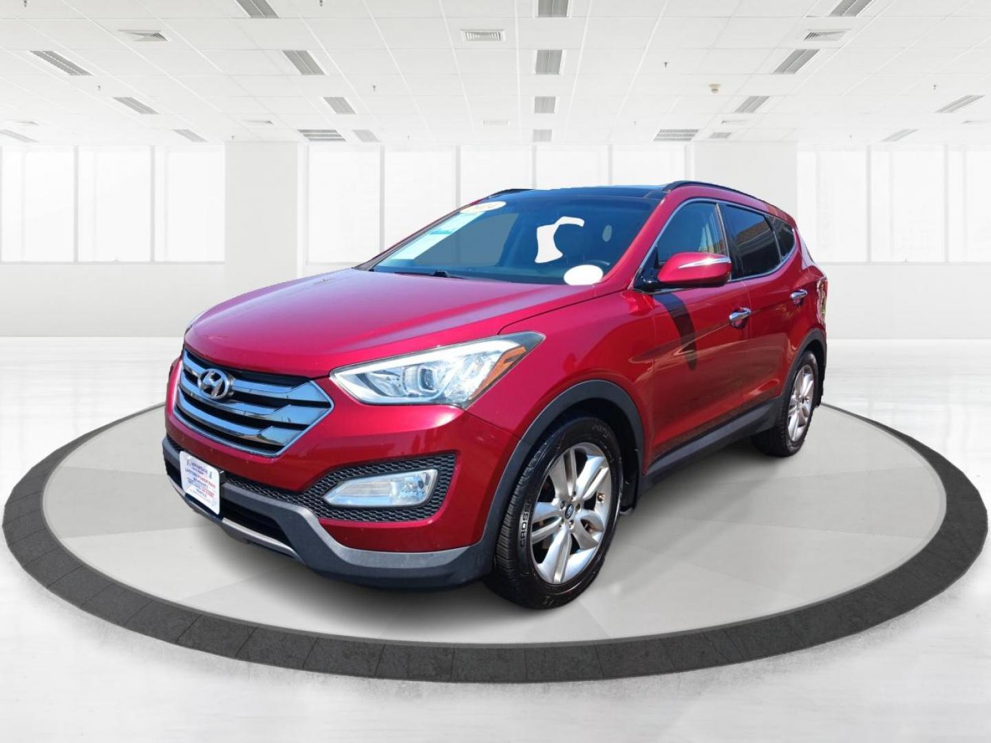 2014 Serrano Red Hyundai Santa Fe (5XYZW3LA0EG) with an 2.0L L4 DOHC 16V TURBO engine, 6-Speed Automatic transmission, located at 1099 N County Rd 25A, Troy, OH, 45373, (937) 908-9800, 40.057079, -84.212883 - Photo#7