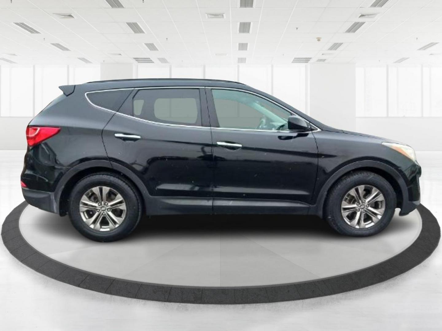 2014 Twilight Black Hyundai Santa Fe (5XYZU3LB5EG) with an 2.4L L4 DOHC 16V engine, 6-Speed Automatic transmission, located at 4508 South Dixie Dr, Moraine, OH, 45439, (937) 908-9800, 39.689976, -84.218452 - Photo#1