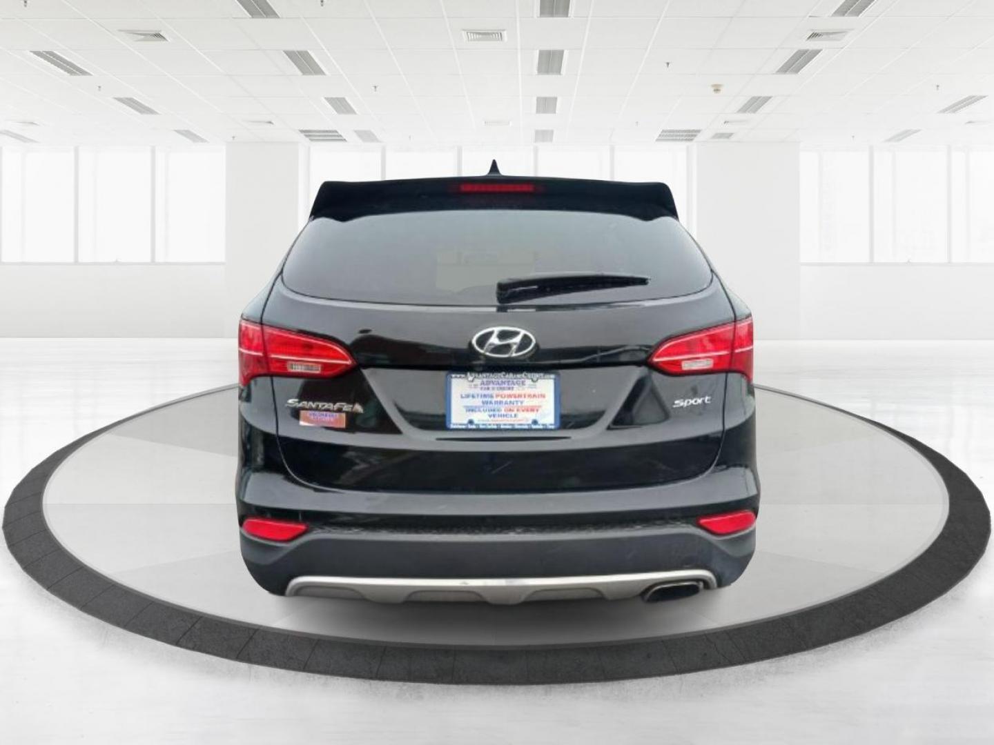 2014 Twilight Black Hyundai Santa Fe (5XYZU3LB5EG) with an 2.4L L4 DOHC 16V engine, 6-Speed Automatic transmission, located at 4508 South Dixie Dr, Moraine, OH, 45439, (937) 908-9800, 39.689976, -84.218452 - Photo#2