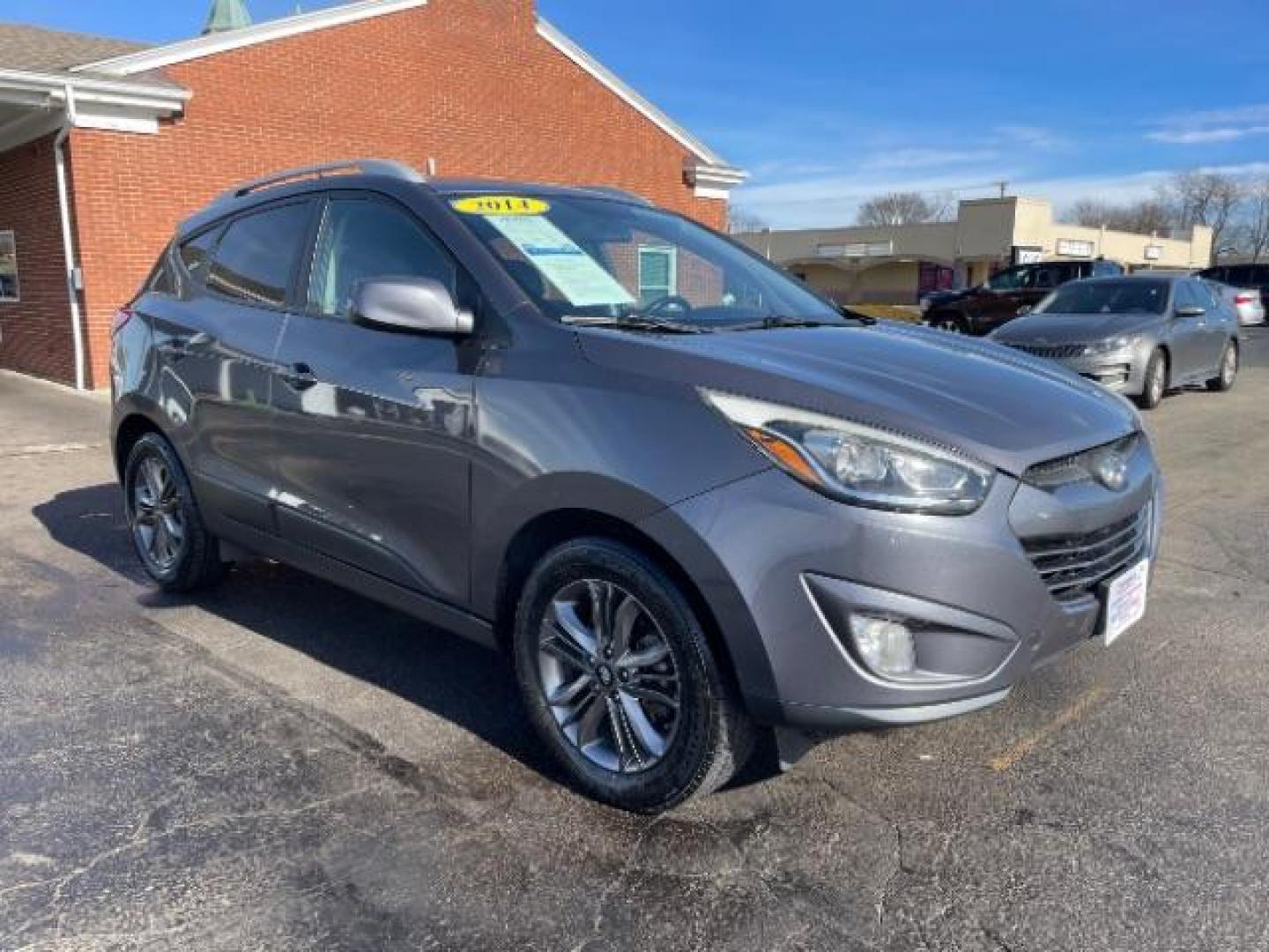 2014 Shadow Grey Hyundai Tucson GLS 2WD (KM8JU3AG9EU) with an 2.4L L4 DOHC 16V engine, 6-Speed Automatic transmission, located at 4508 South Dixie Dr, Moraine, OH, 45439, (937) 908-9800, 39.689976, -84.218452 - Photo#0