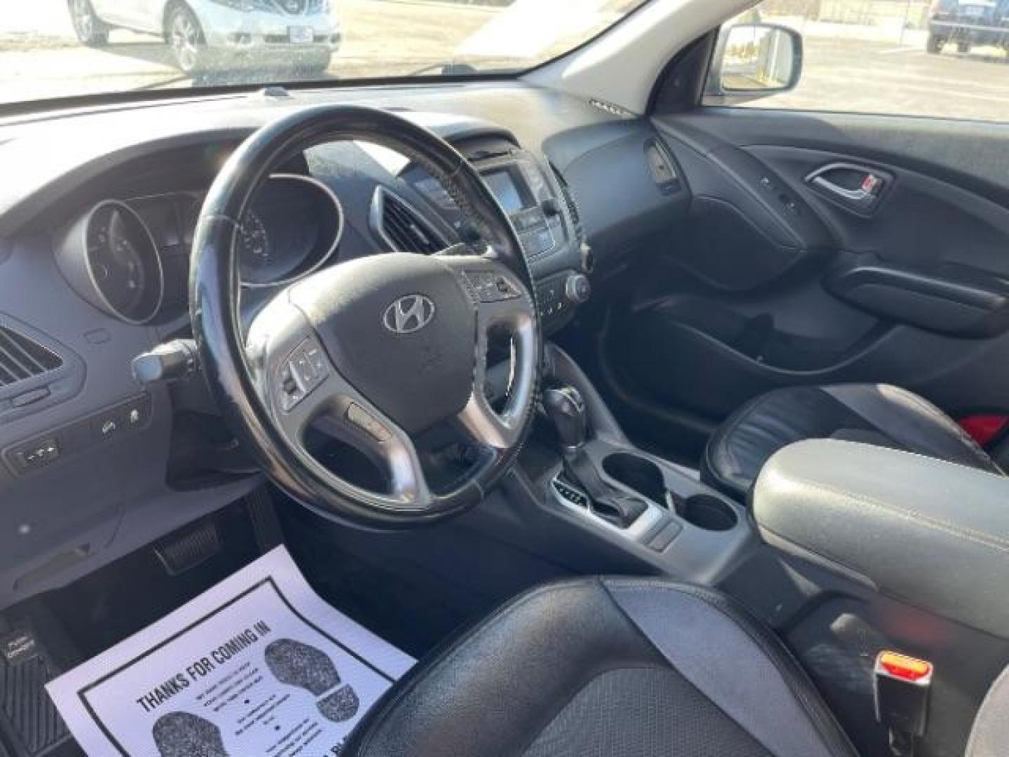 2014 Shadow Grey Hyundai Tucson GLS 2WD (KM8JU3AG9EU) with an 2.4L L4 DOHC 16V engine, 6-Speed Automatic transmission, located at 4508 South Dixie Dr, Moraine, OH, 45439, (937) 908-9800, 39.689976, -84.218452 - Photo#5