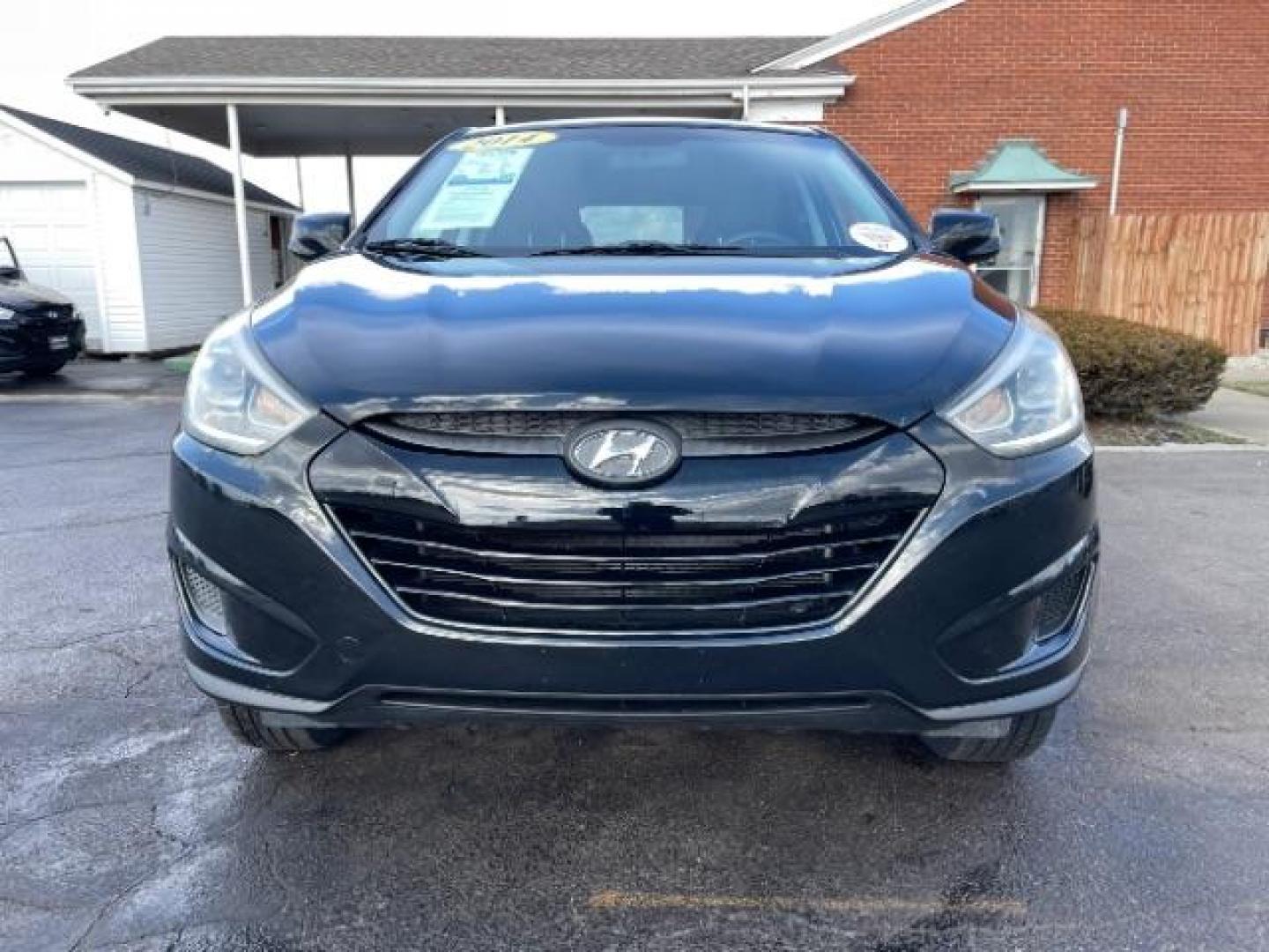 2014 Black Hyundai Tucson GL Auto AWD (KM8JTCAF0EU) with an 2.0L L4 DOHC 16V engine, 6-Speed Automatic transmission, located at 4508 South Dixie Dr, Moraine, OH, 45439, (937) 908-9800, 39.689976, -84.218452 - Photo#2