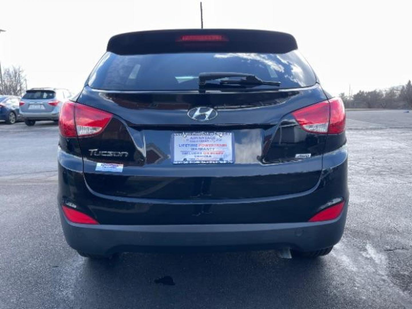 2014 Black Hyundai Tucson GL Auto AWD (KM8JTCAF0EU) with an 2.0L L4 DOHC 16V engine, 6-Speed Automatic transmission, located at 4508 South Dixie Dr, Moraine, OH, 45439, (937) 908-9800, 39.689976, -84.218452 - Photo#3