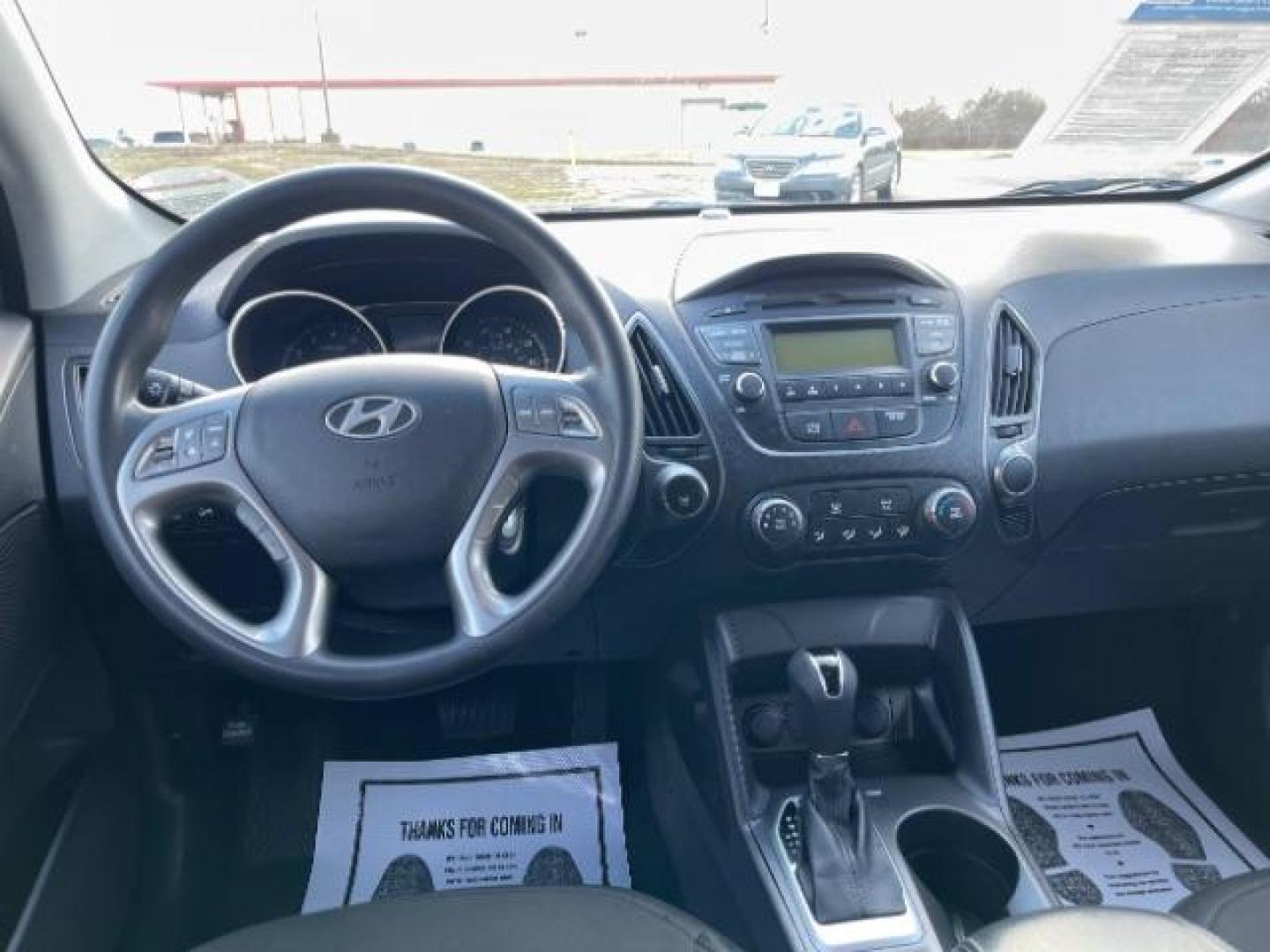 2014 Black Hyundai Tucson GL Auto AWD (KM8JTCAF0EU) with an 2.0L L4 DOHC 16V engine, 6-Speed Automatic transmission, located at 4508 South Dixie Dr, Moraine, OH, 45439, (937) 908-9800, 39.689976, -84.218452 - Photo#7