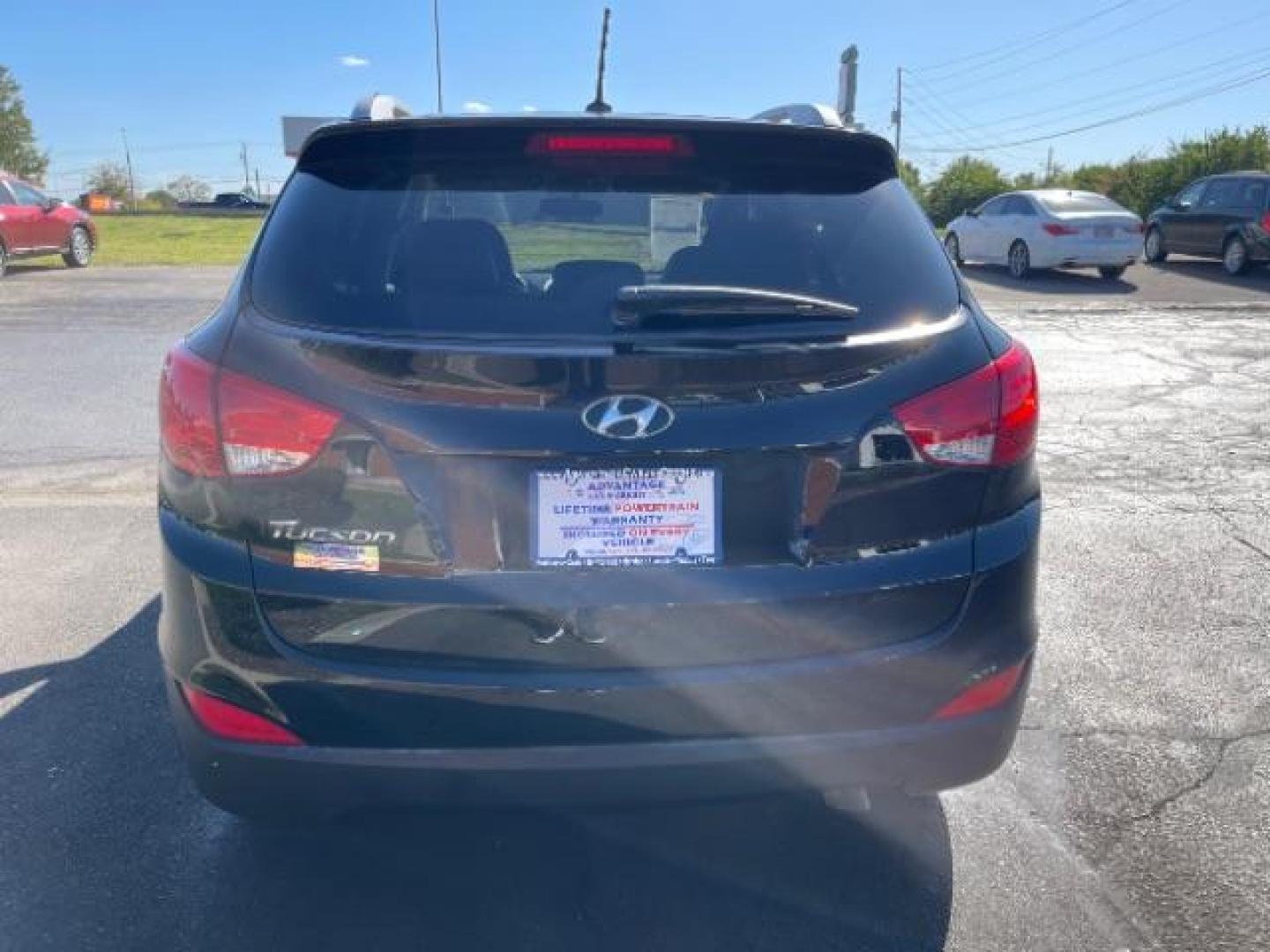 2014 Ash Black Hyundai Tucson GLS 2WD (KM8JU3AG6EU) with an 2.4L L4 DOHC 16V engine, 6-Speed Automatic transmission, located at 1951 S Dayton Lakeview Rd., New Carlisle, OH, 45344, (937) 908-9800, 39.890999, -84.050255 - Photo#3