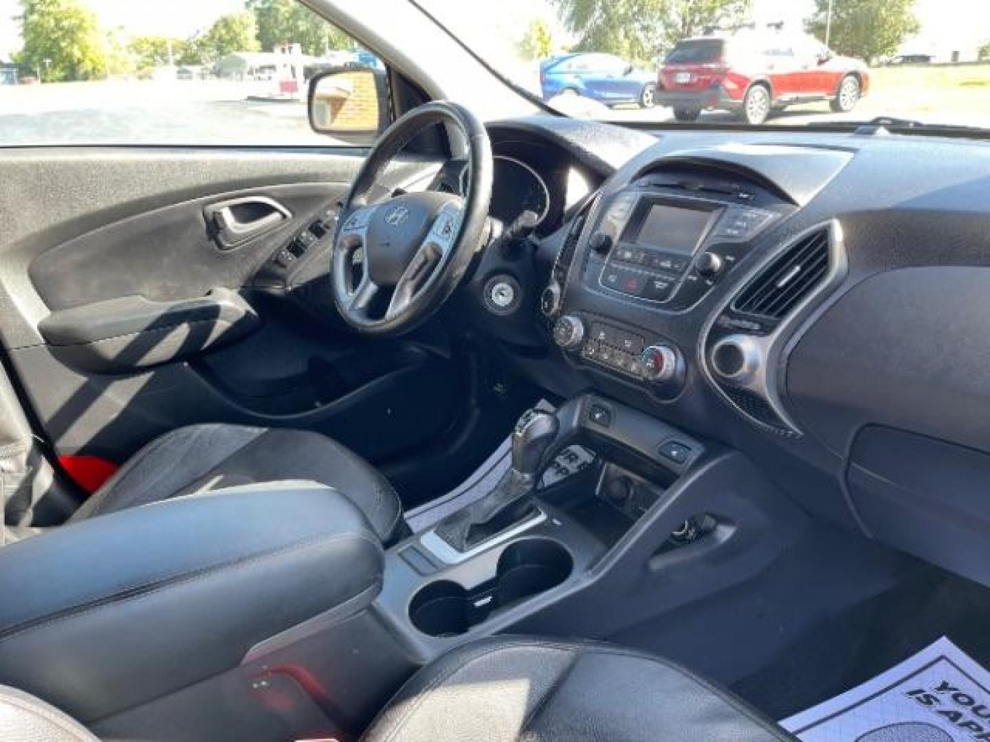 2014 Ash Black Hyundai Tucson GLS 2WD (KM8JU3AG6EU) with an 2.4L L4 DOHC 16V engine, 6-Speed Automatic transmission, located at 1951 S Dayton Lakeview Rd., New Carlisle, OH, 45344, (937) 908-9800, 39.890999, -84.050255 - Photo#8