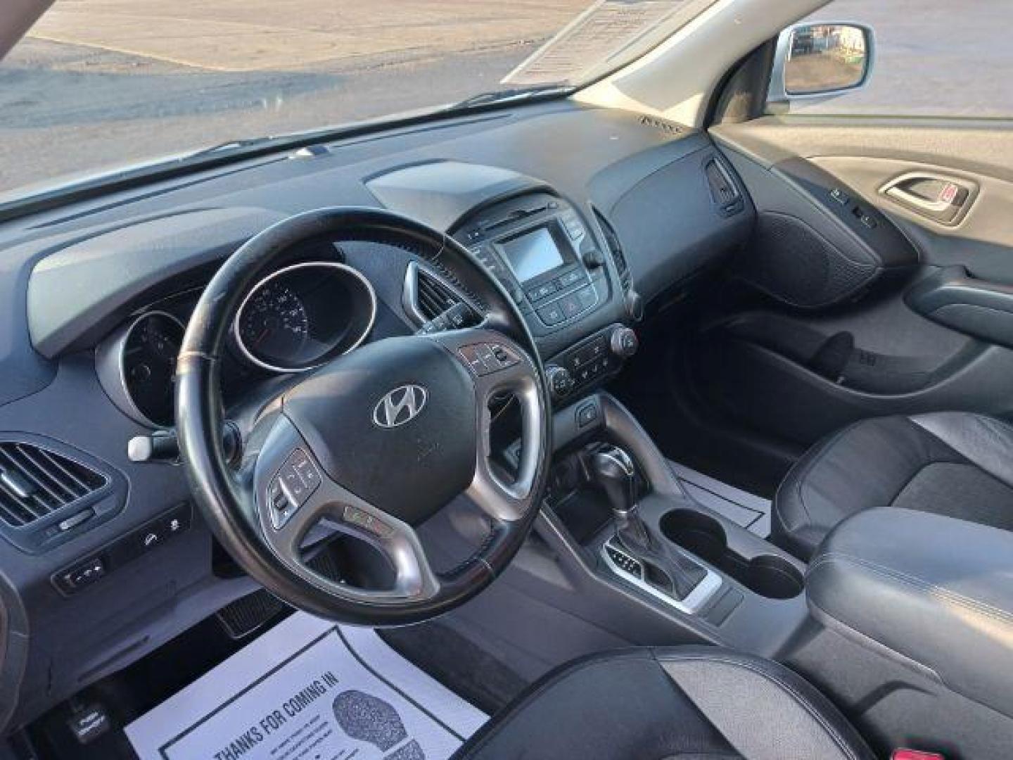 2014 Diamond Silver Hyundai Tucson GLS 2WD (KM8JU3AG9EU) with an 2.4L L4 DOHC 16V engine, 6-Speed Automatic transmission, located at 1184 Kauffman Ave, Fairborn, OH, 45324, (937) 908-9800, 39.807072, -84.030914 - Photo#6