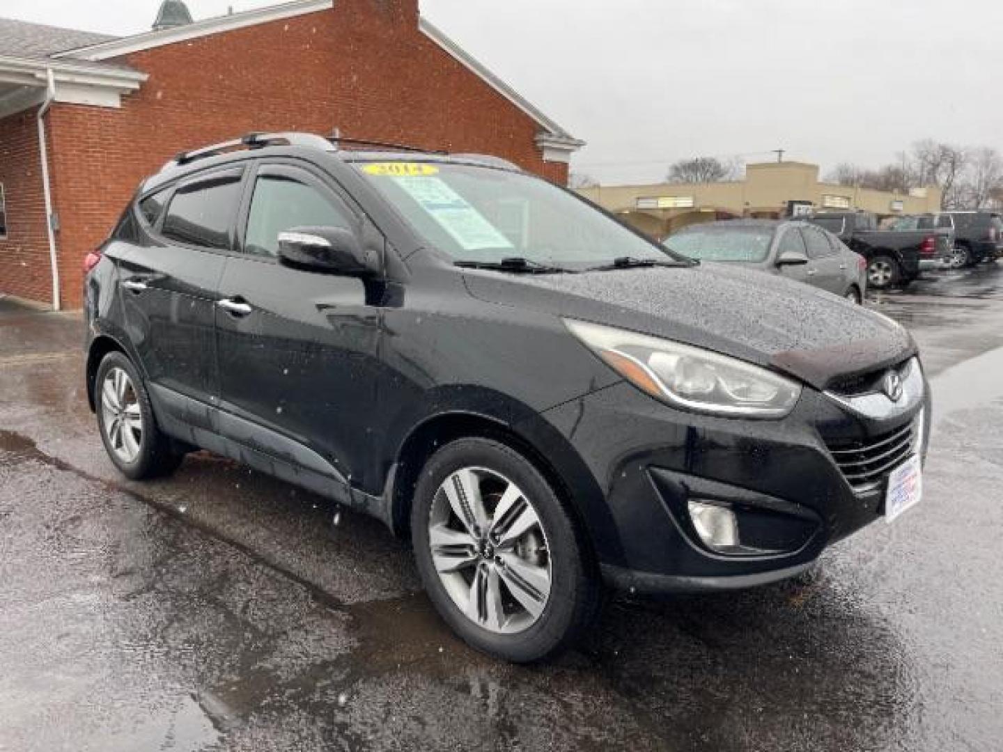 2014 Ash Black Hyundai Tucson GLS AWD (KM8JUCAG3EU) with an 2.4L L4 DOHC 16V engine, 6-Speed Automatic transmission, located at 1099 N County Rd 25A, Troy, OH, 45373, (937) 908-9800, 40.057079, -84.212883 - Photo#0