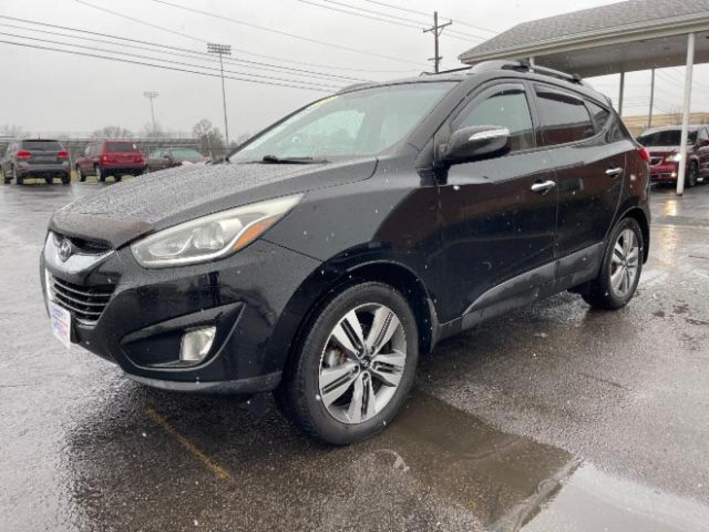 2014 Ash Black Hyundai Tucson GLS AWD (KM8JUCAG3EU) with an 2.4L L4 DOHC 16V engine, 6-Speed Automatic transmission, located at 1099 N County Rd 25A, Troy, OH, 45373, (937) 908-9800, 40.057079, -84.212883 - Photo#1