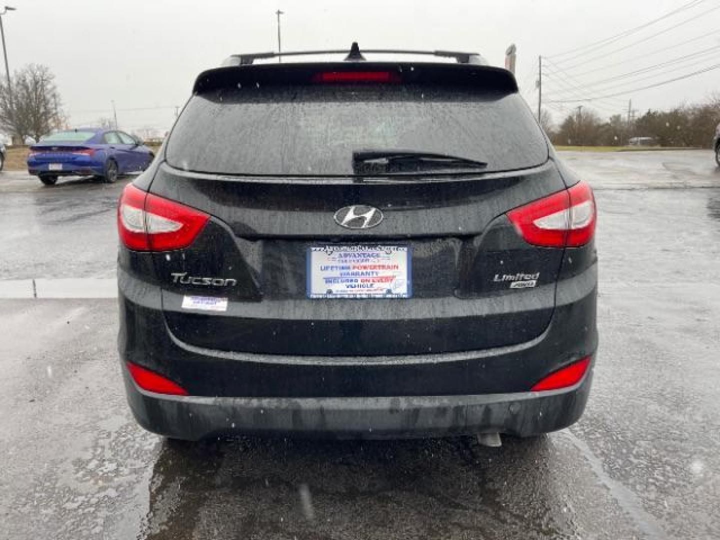 2014 Ash Black Hyundai Tucson GLS AWD (KM8JUCAG3EU) with an 2.4L L4 DOHC 16V engine, 6-Speed Automatic transmission, located at 1099 N County Rd 25A, Troy, OH, 45373, (937) 908-9800, 40.057079, -84.212883 - Photo#4