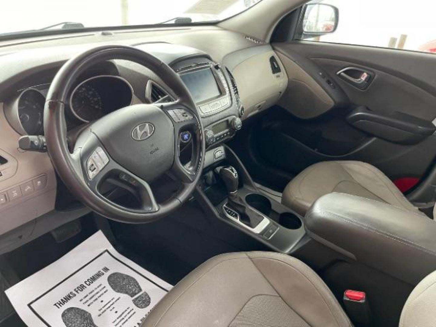 2014 Ash Black Hyundai Tucson GLS AWD (KM8JUCAG3EU) with an 2.4L L4 DOHC 16V engine, 6-Speed Automatic transmission, located at 1099 N County Rd 25A, Troy, OH, 45373, (937) 908-9800, 40.057079, -84.212883 - Photo#6