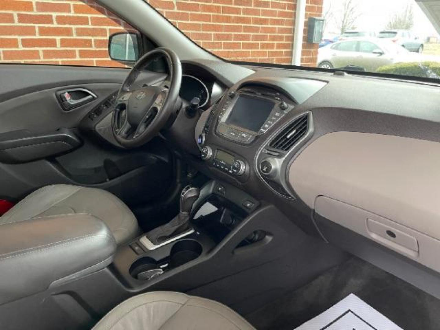 2014 Ash Black Hyundai Tucson GLS AWD (KM8JUCAG3EU) with an 2.4L L4 DOHC 16V engine, 6-Speed Automatic transmission, located at 1099 N County Rd 25A, Troy, OH, 45373, (937) 908-9800, 40.057079, -84.212883 - Photo#8