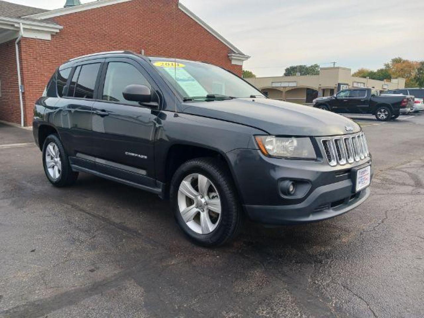 2014 Maximum Steel Metallic CC Jeep Compass Sport 4WD (1C4NJDBB5ED) with an 2.4L L4 DOHC 16V engine, located at 4508 South Dixie Dr, Moraine, OH, 45439, (937) 908-9800, 39.689976, -84.218452 - Photo#0