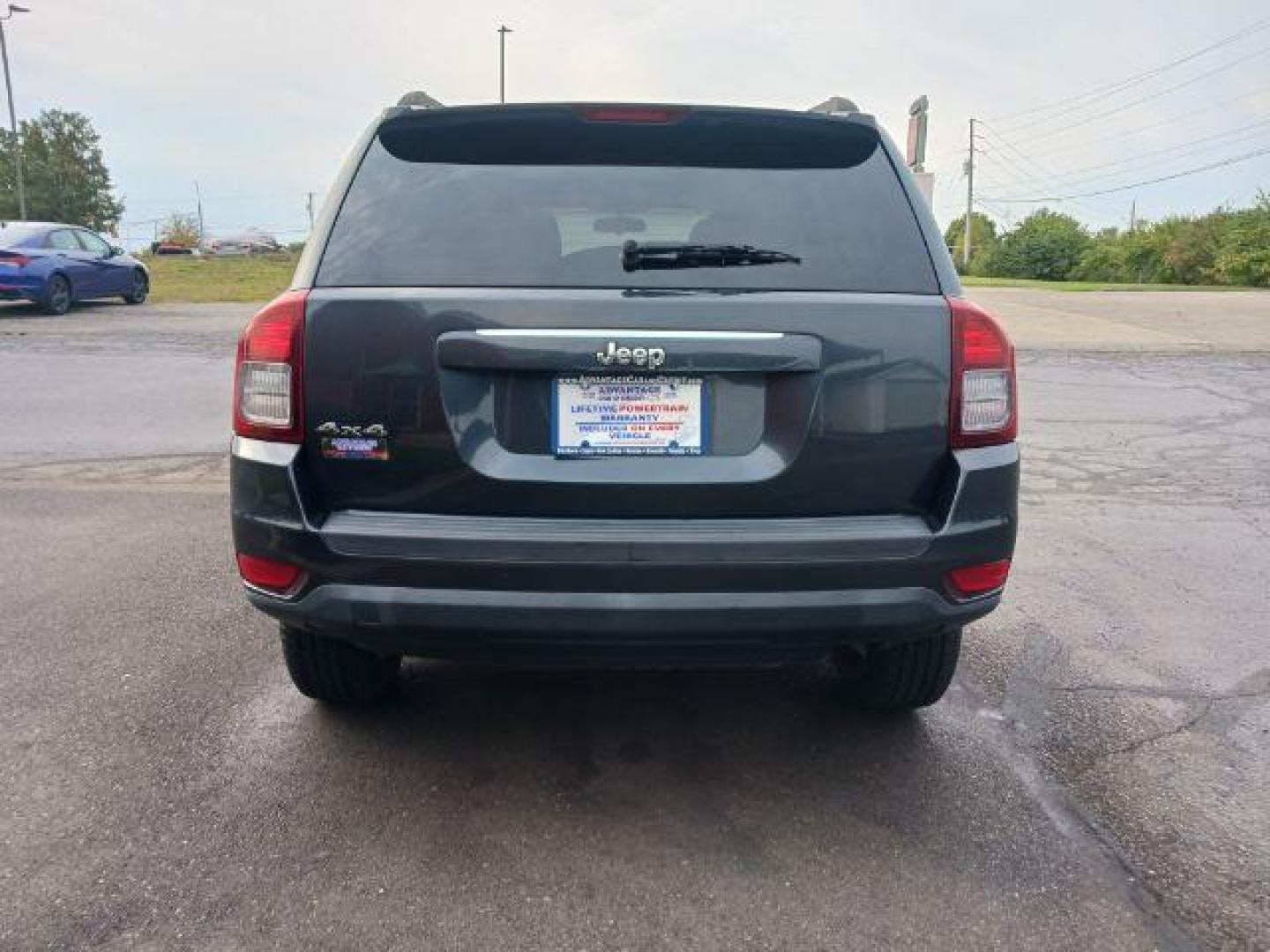 2014 Maximum Steel Metallic CC Jeep Compass Sport 4WD (1C4NJDBB5ED) with an 2.4L L4 DOHC 16V engine, located at 4508 South Dixie Dr, Moraine, OH, 45439, (937) 908-9800, 39.689976, -84.218452 - Photo#5